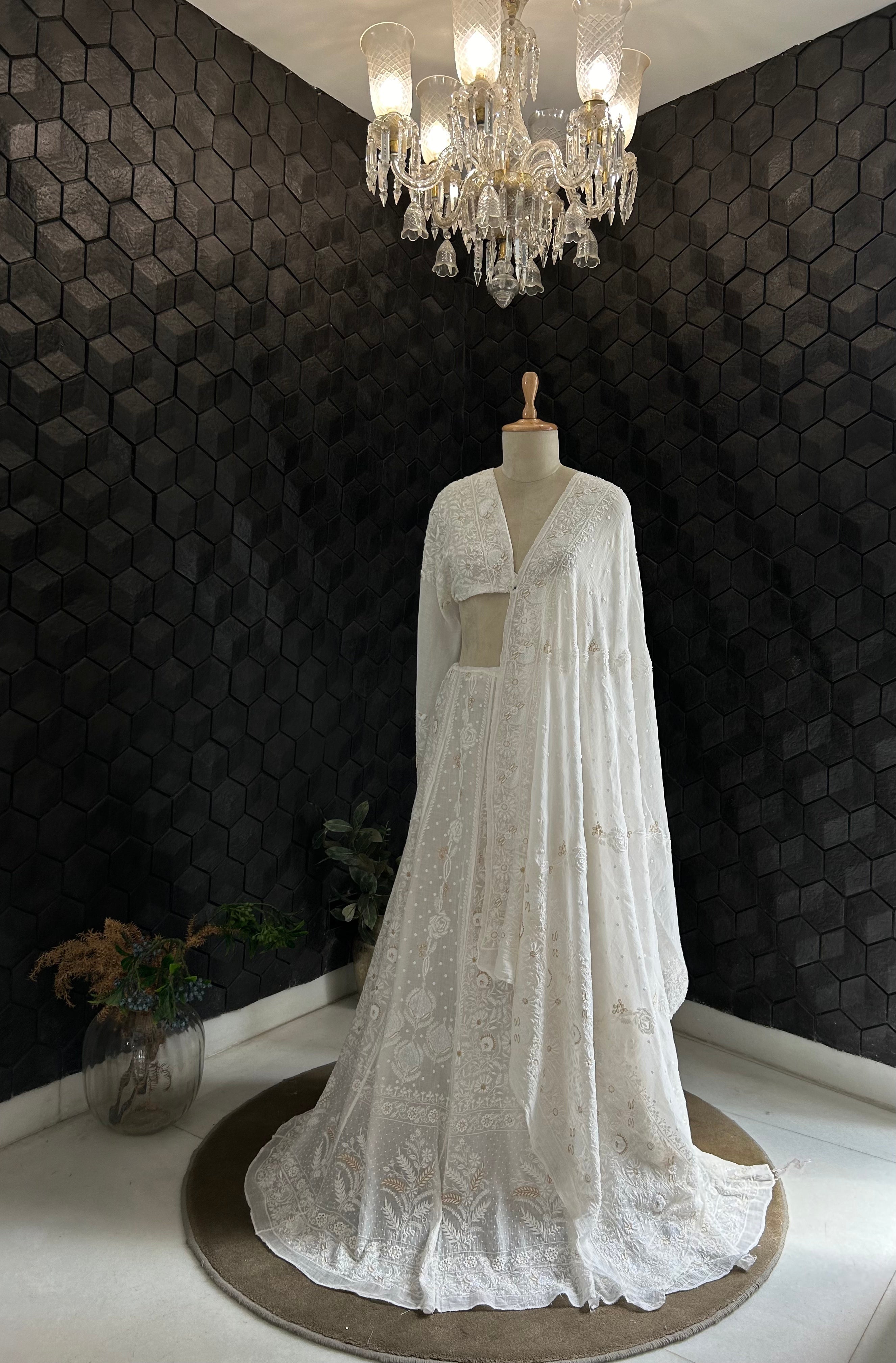 Premium white mul chanderi chikankari lehenga with statement pearl and kasab work
