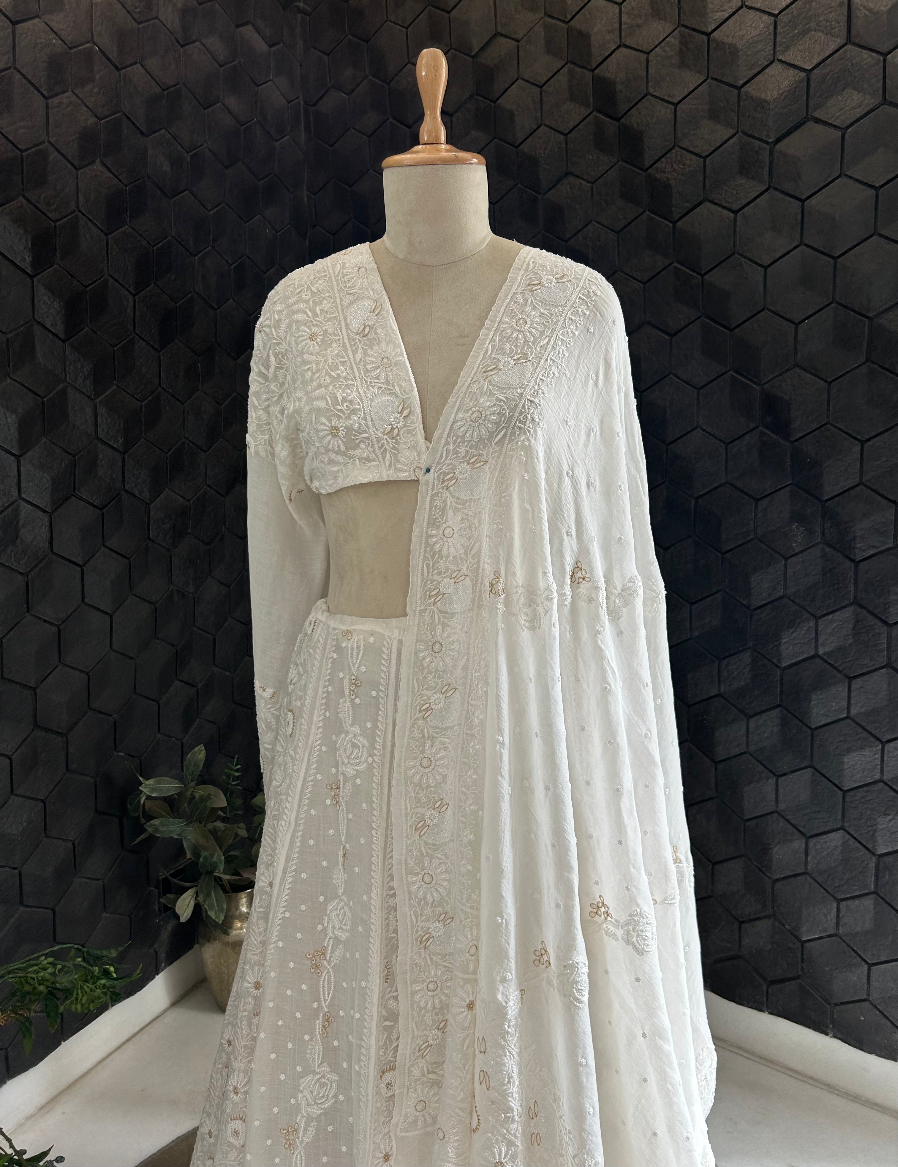 Premium white mul chanderi chikankari lehenga with statement pearl and kasab work