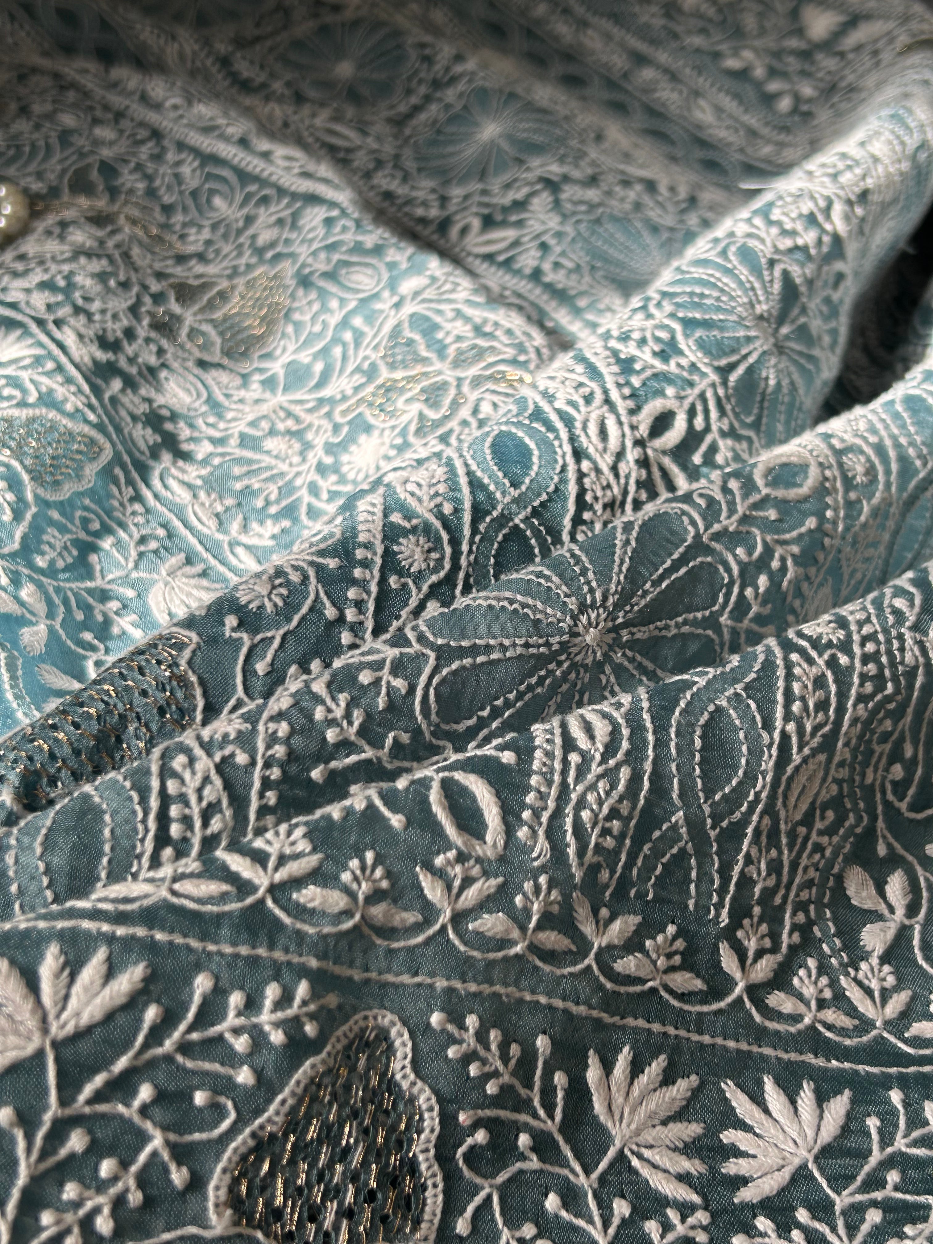 Exclusive Teal Blue Organza Chikankari Saree with statement paan boota