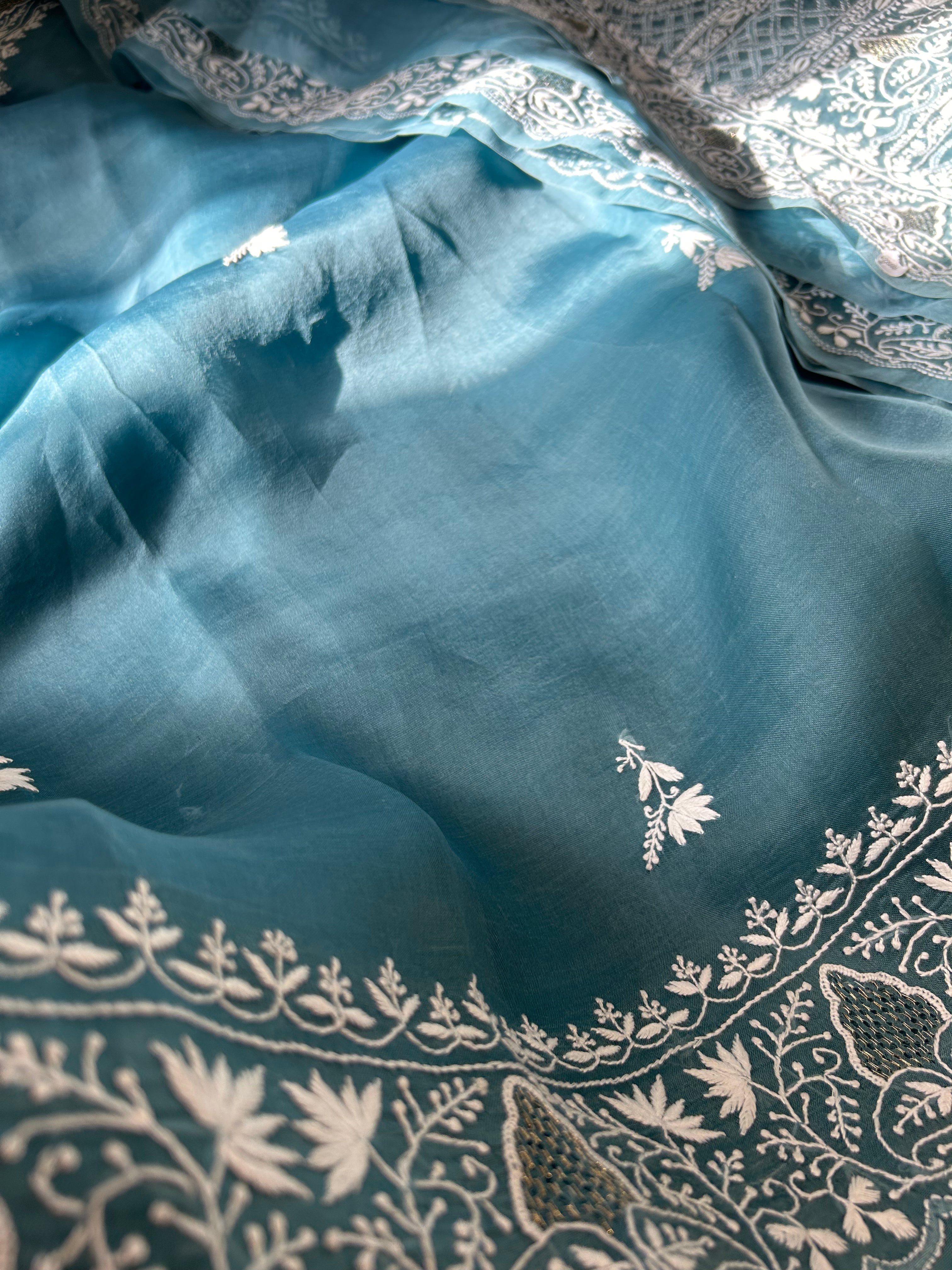 Exclusive Teal Blue Organza Chikankari Saree with statement paan boota