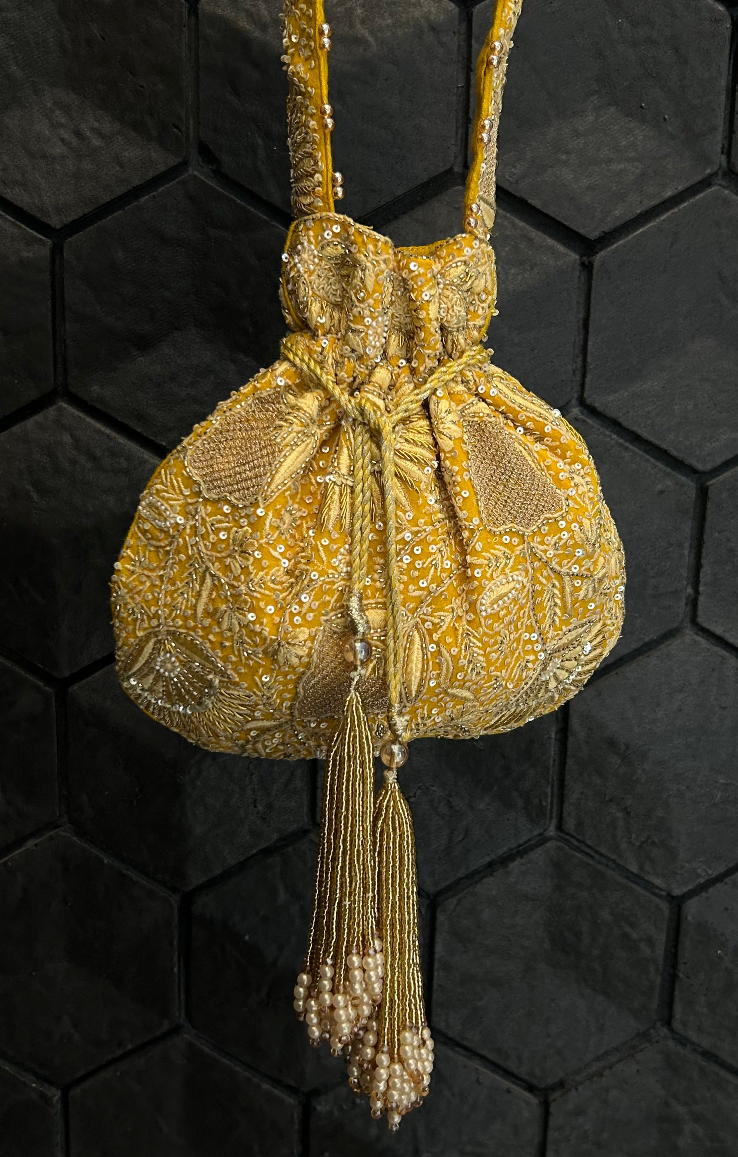 Yellow embellished chikankari potli bag