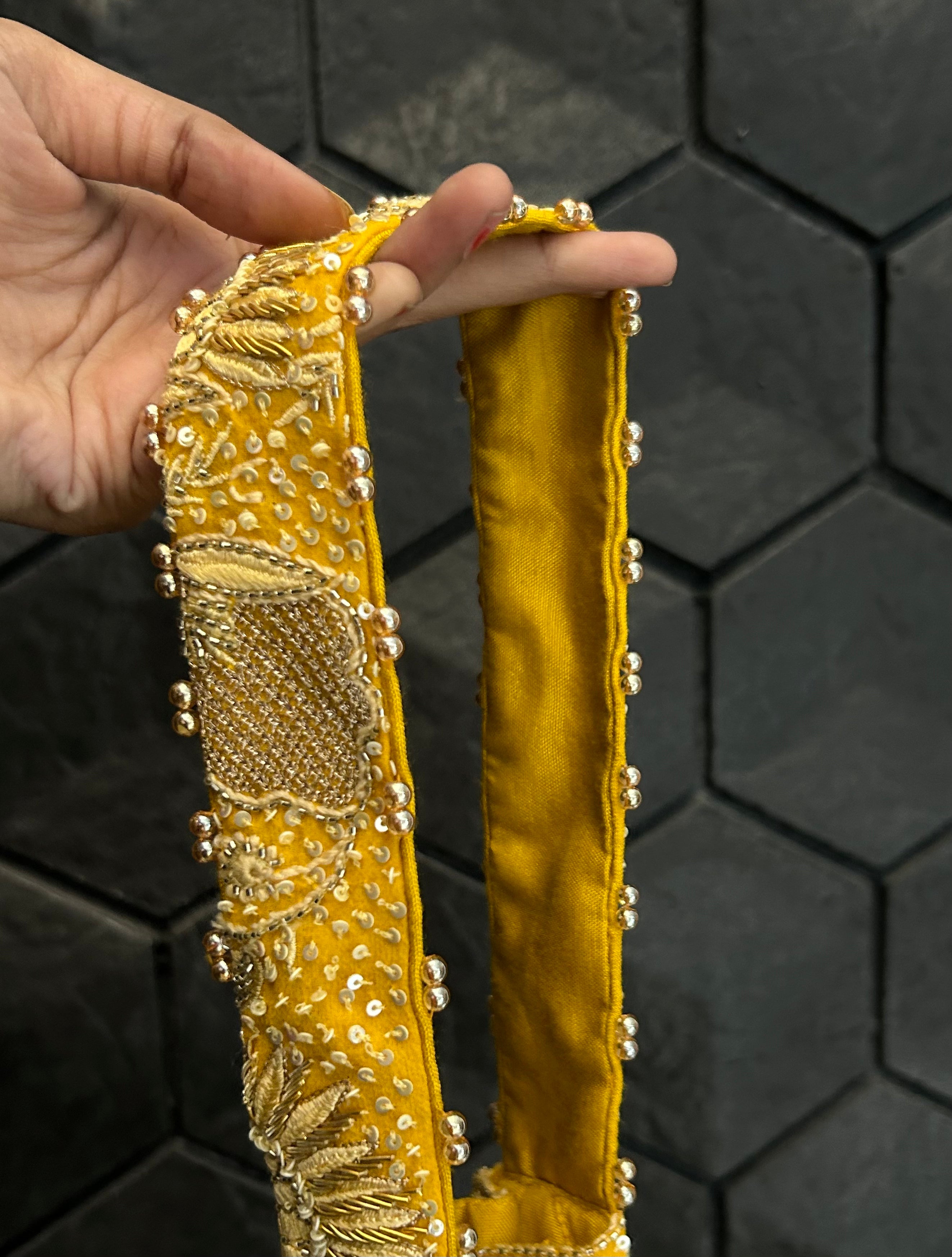 Yellow embellished chikankari potli bag