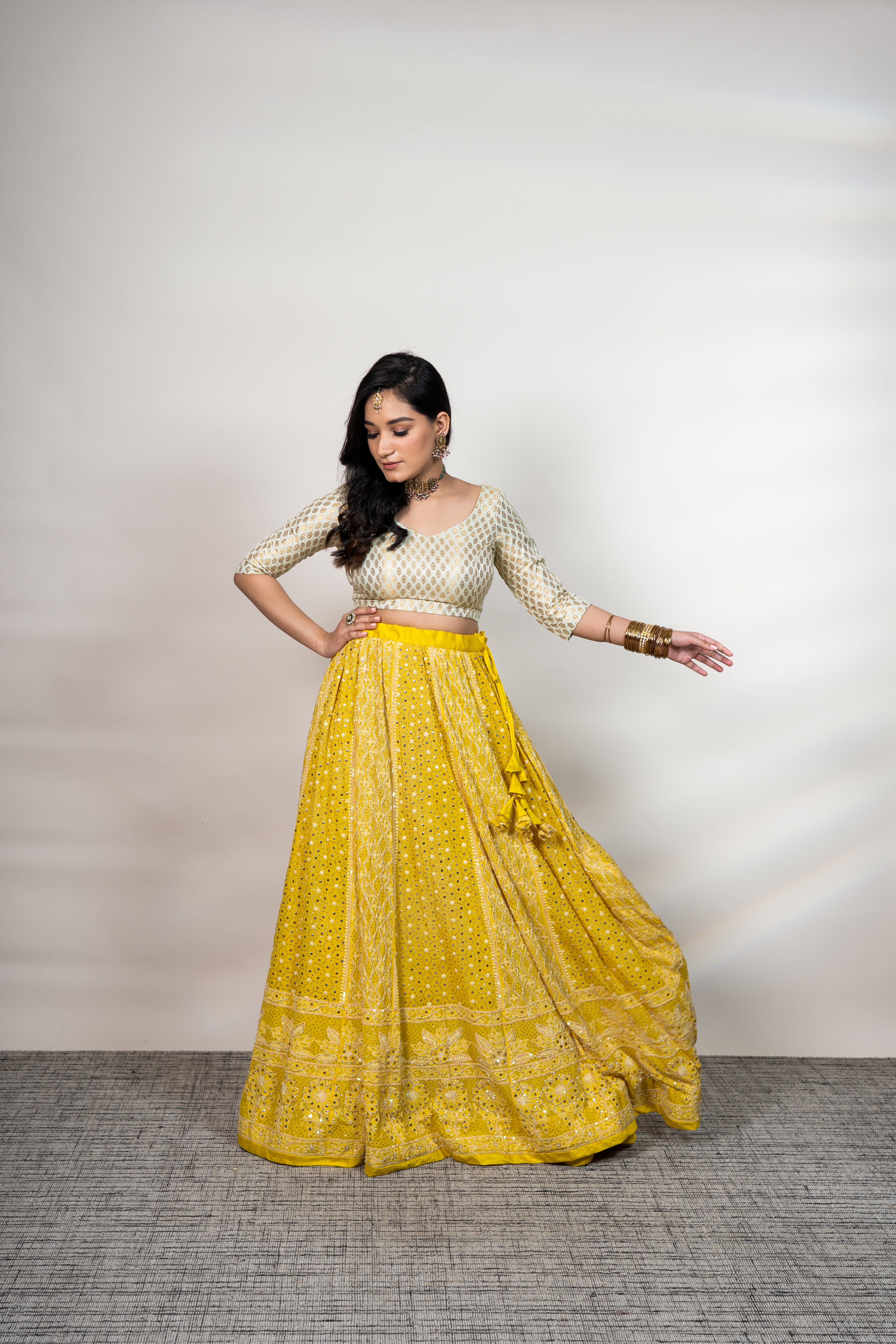 Masoom Minawala in yellow chikanakari and mukaish lehenga set