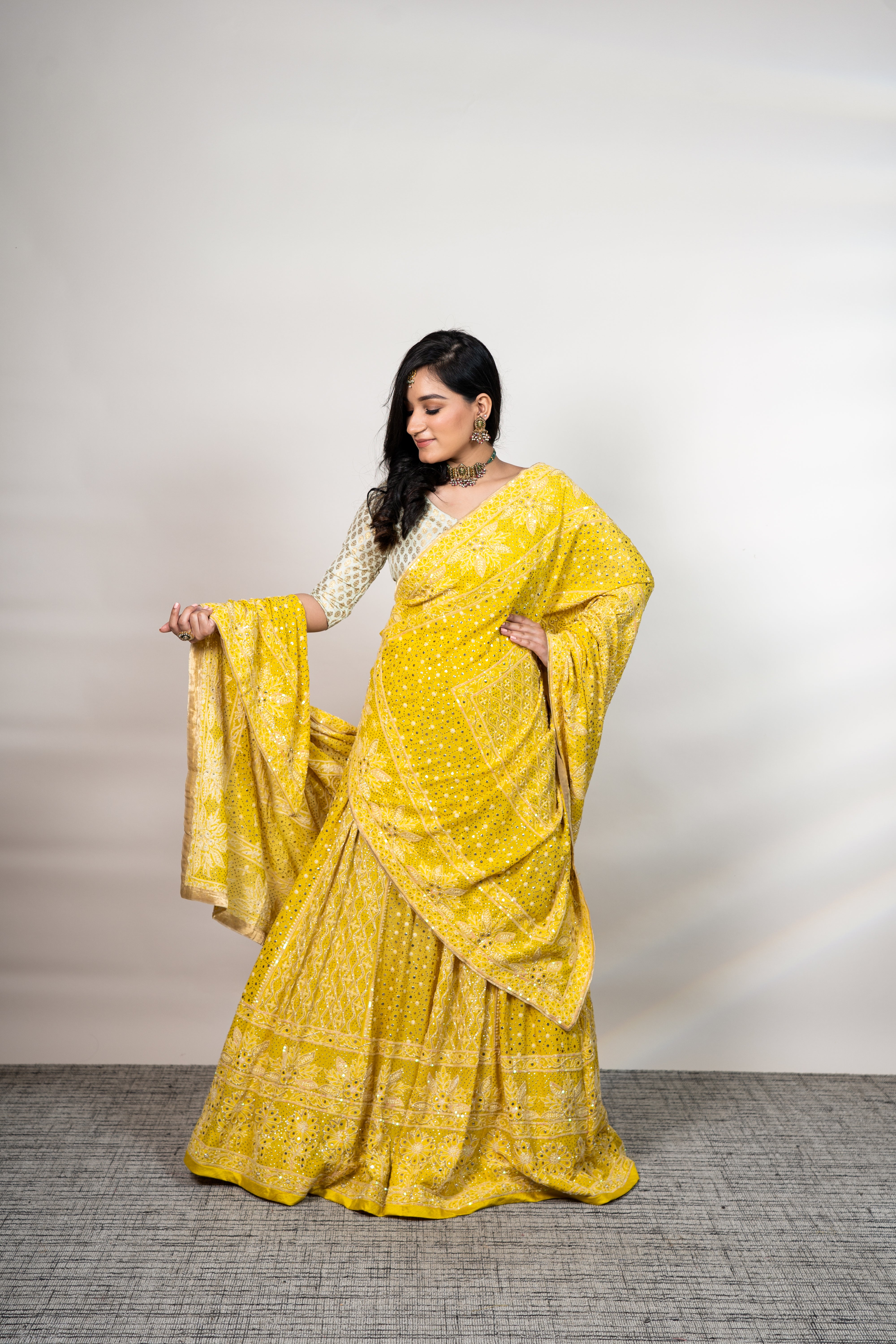 Masoom Minawala in yellow chikanakari and mukaish lehenga set