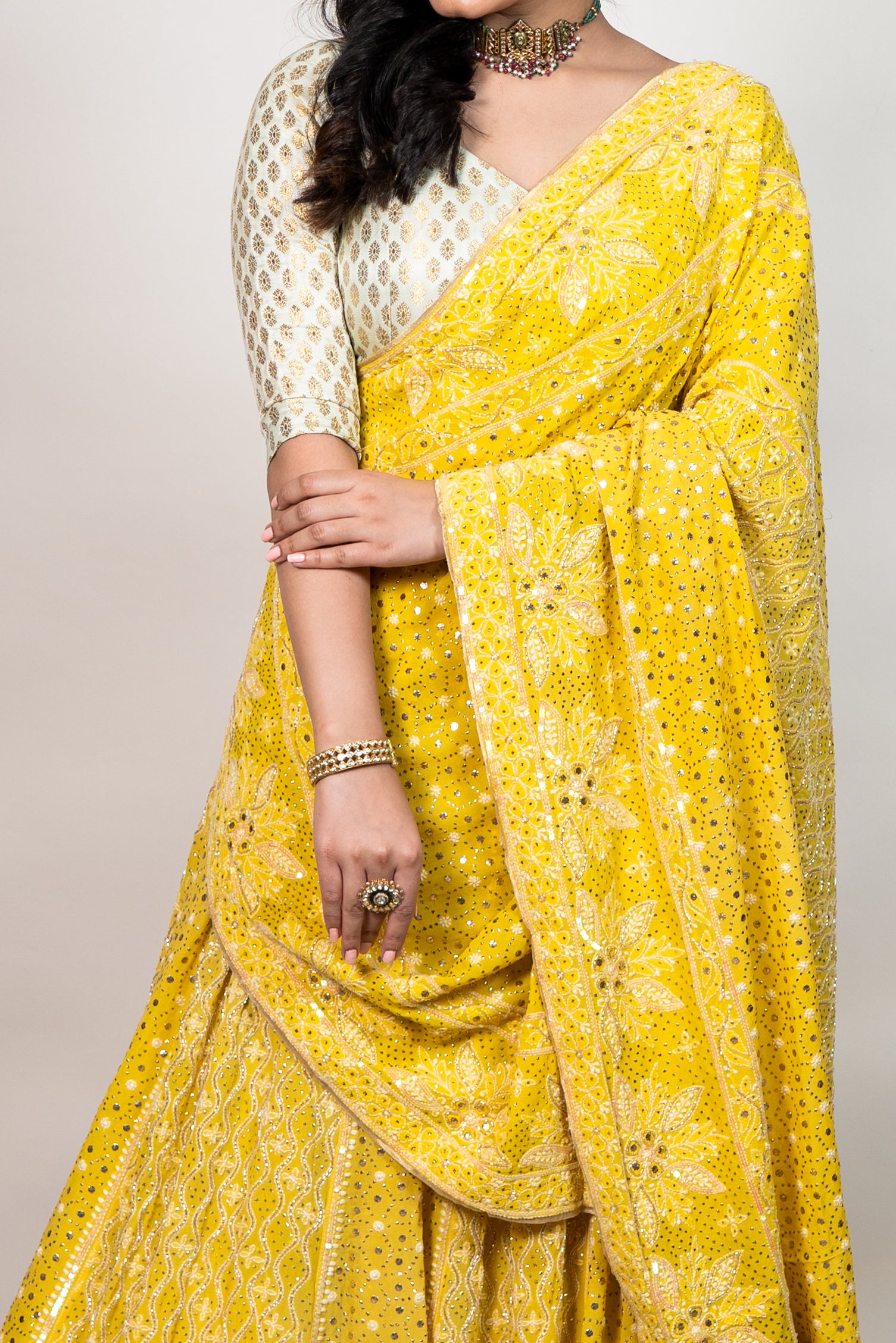 Masoom Minawala in yellow chikanakari and mukaish lehenga set