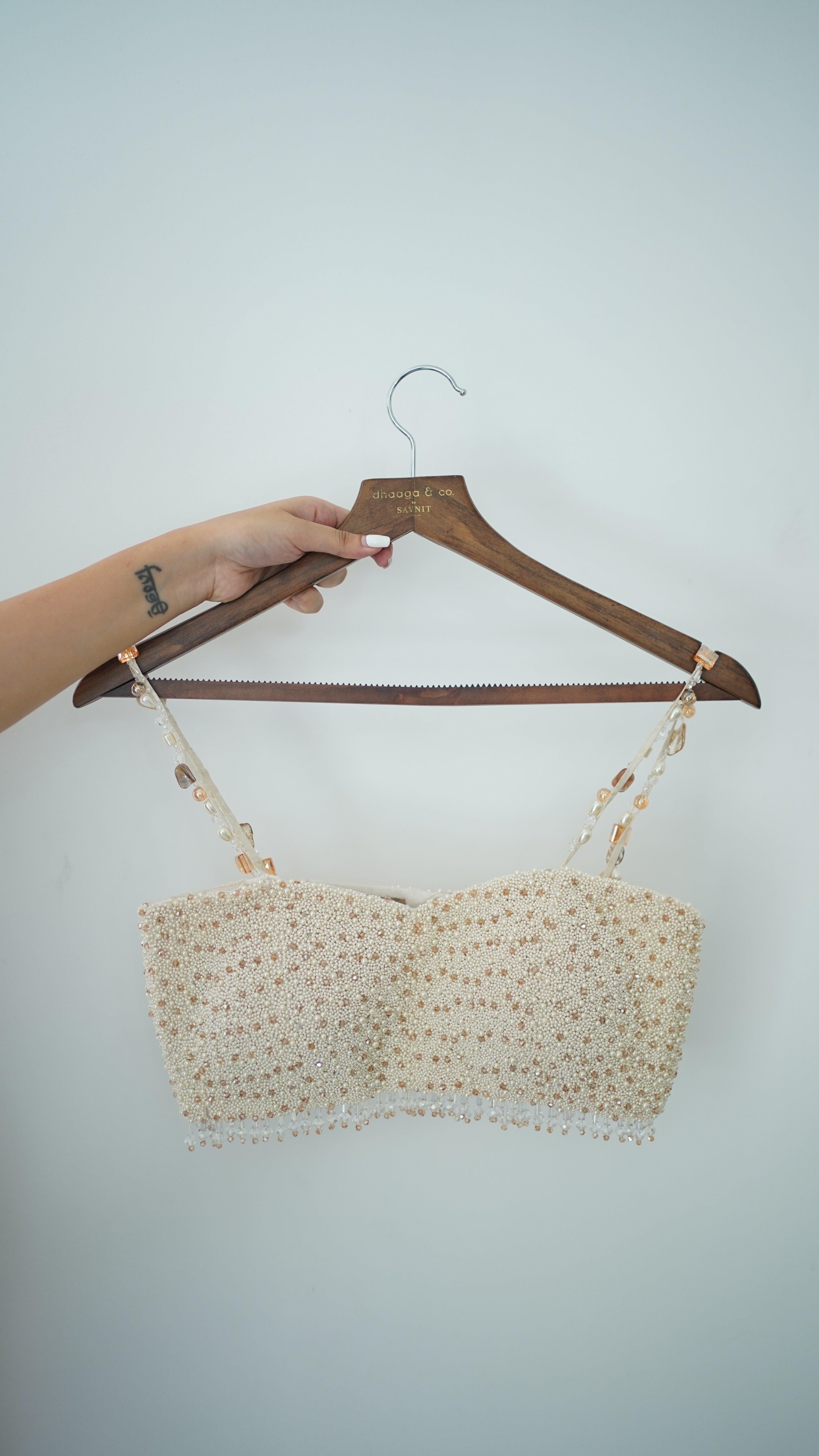 Ivory Chanderi Lehenga paired with embellished blouse