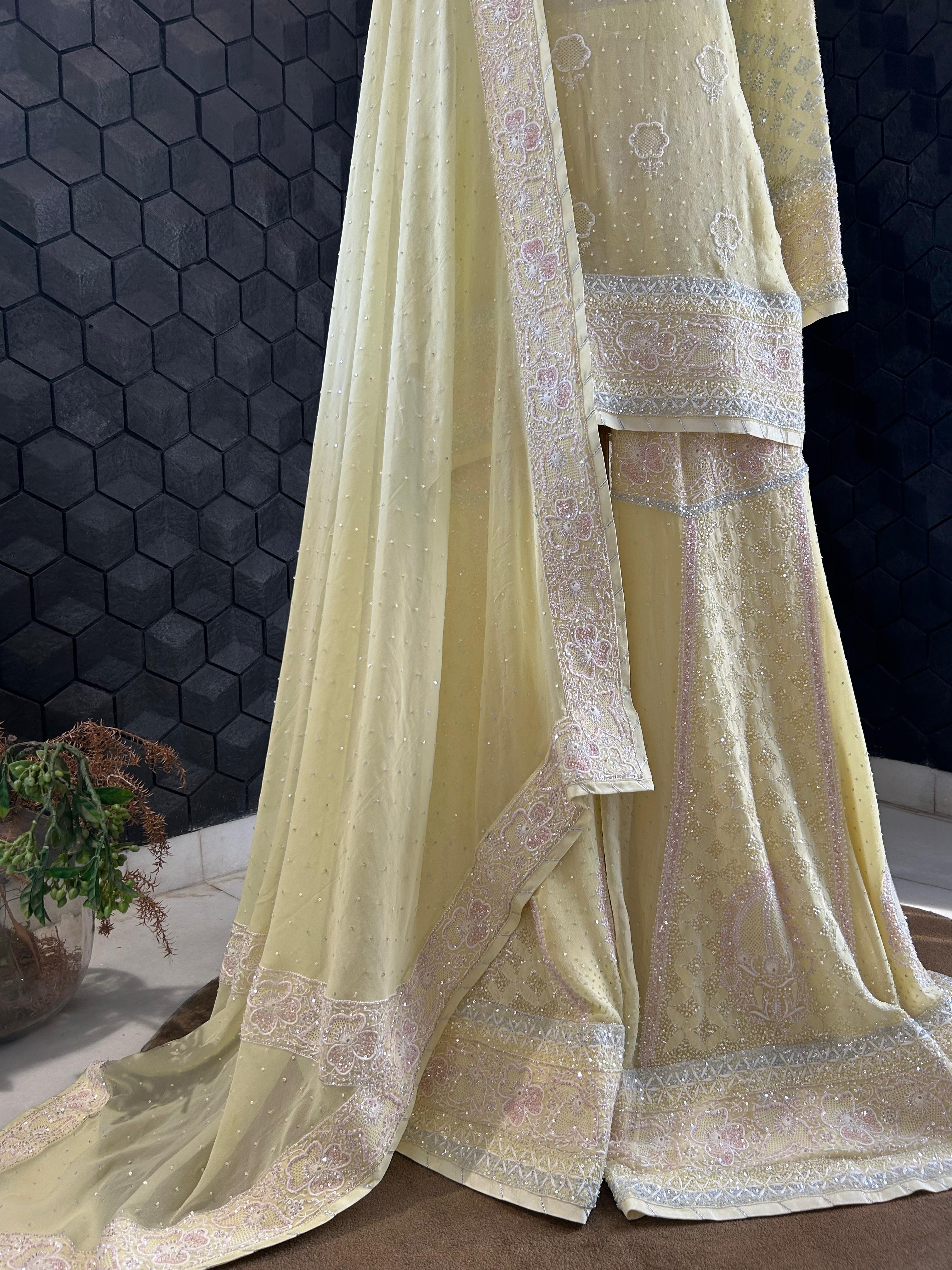 Yellow Georgette ek - taar chikankari sharara set