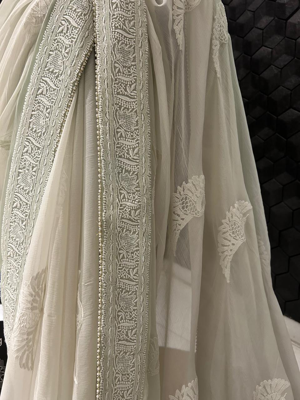 Grey chiffon chikankari saree with bird motif