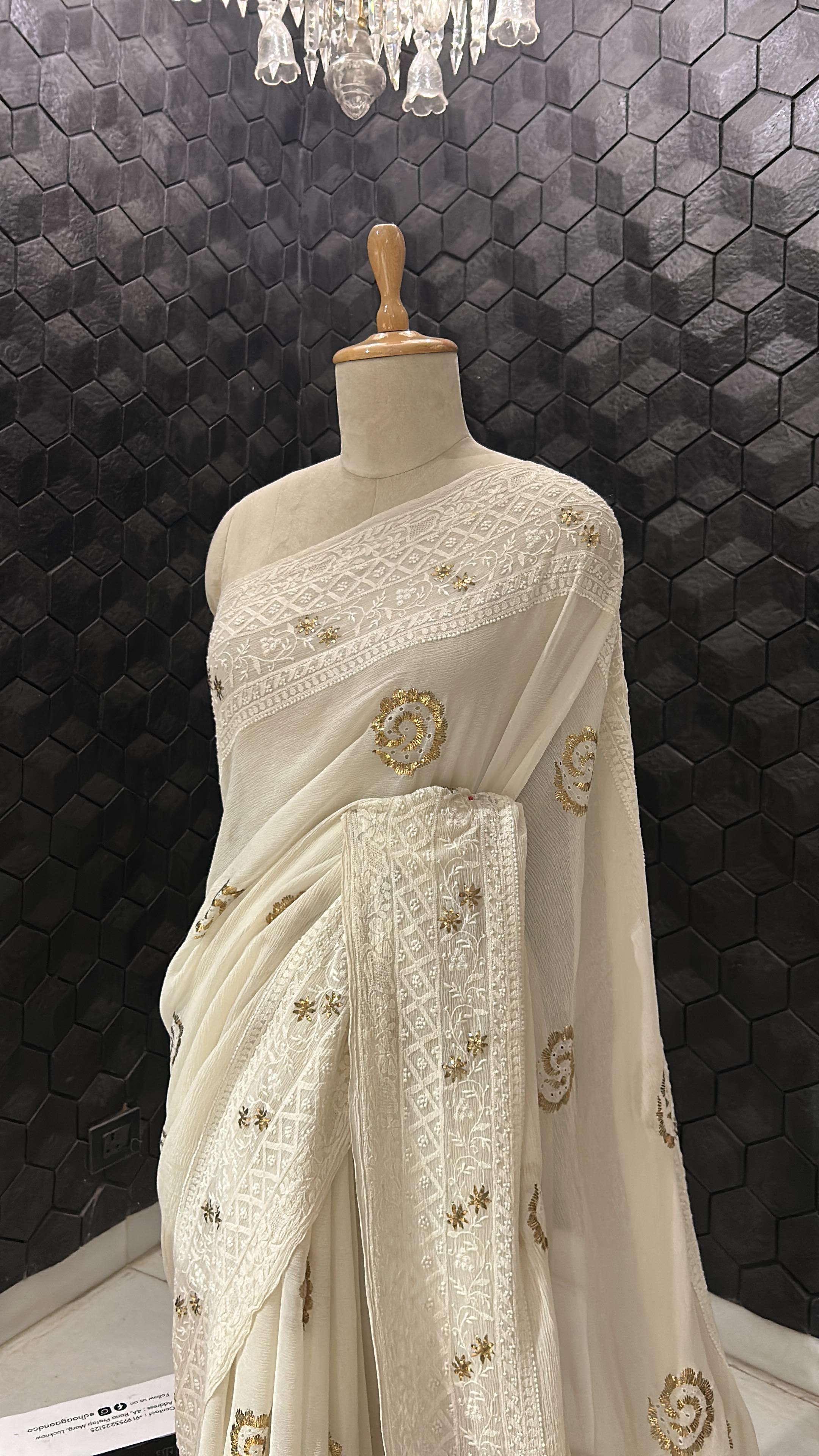 White chiffon chikankari and pitta border saree
