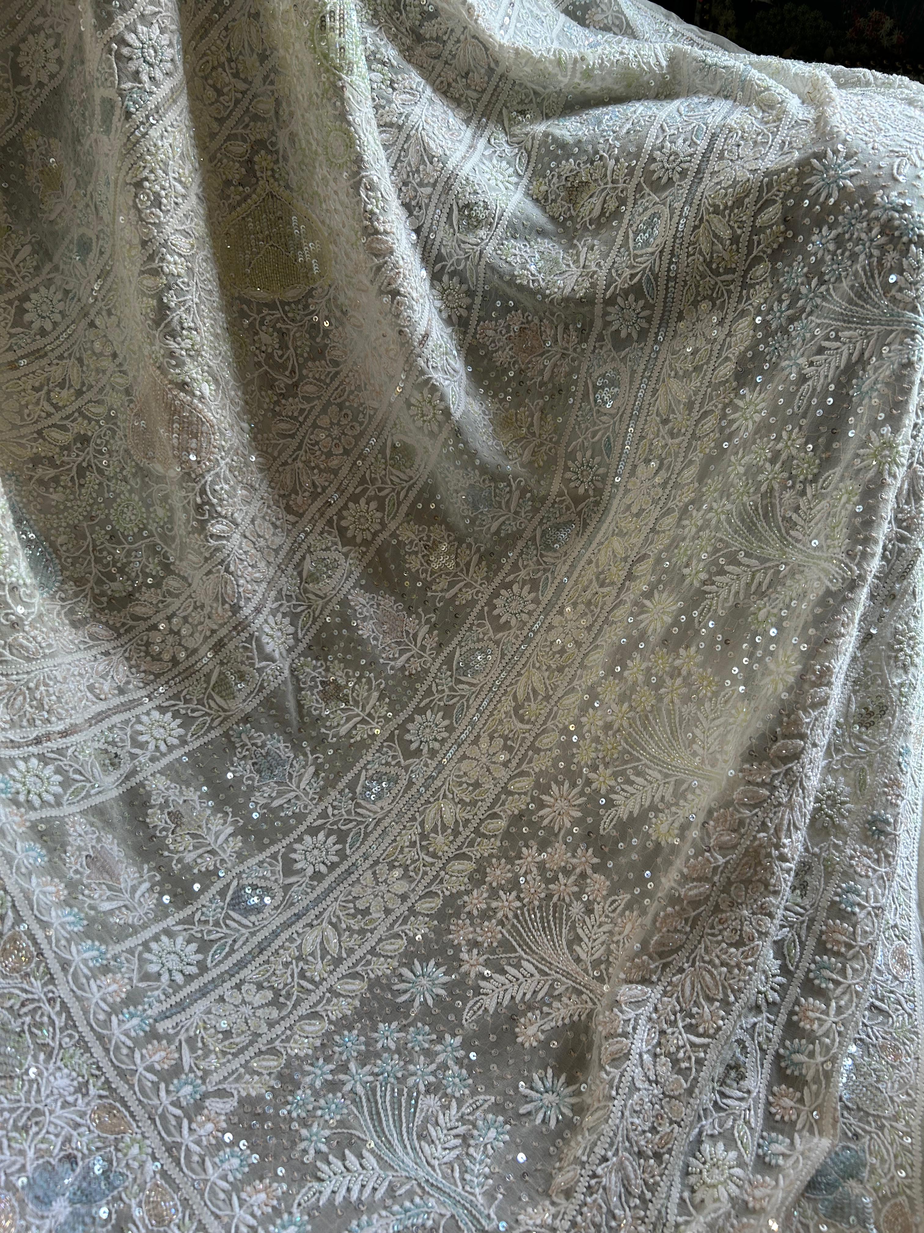 Off - white georgette chikankari saree