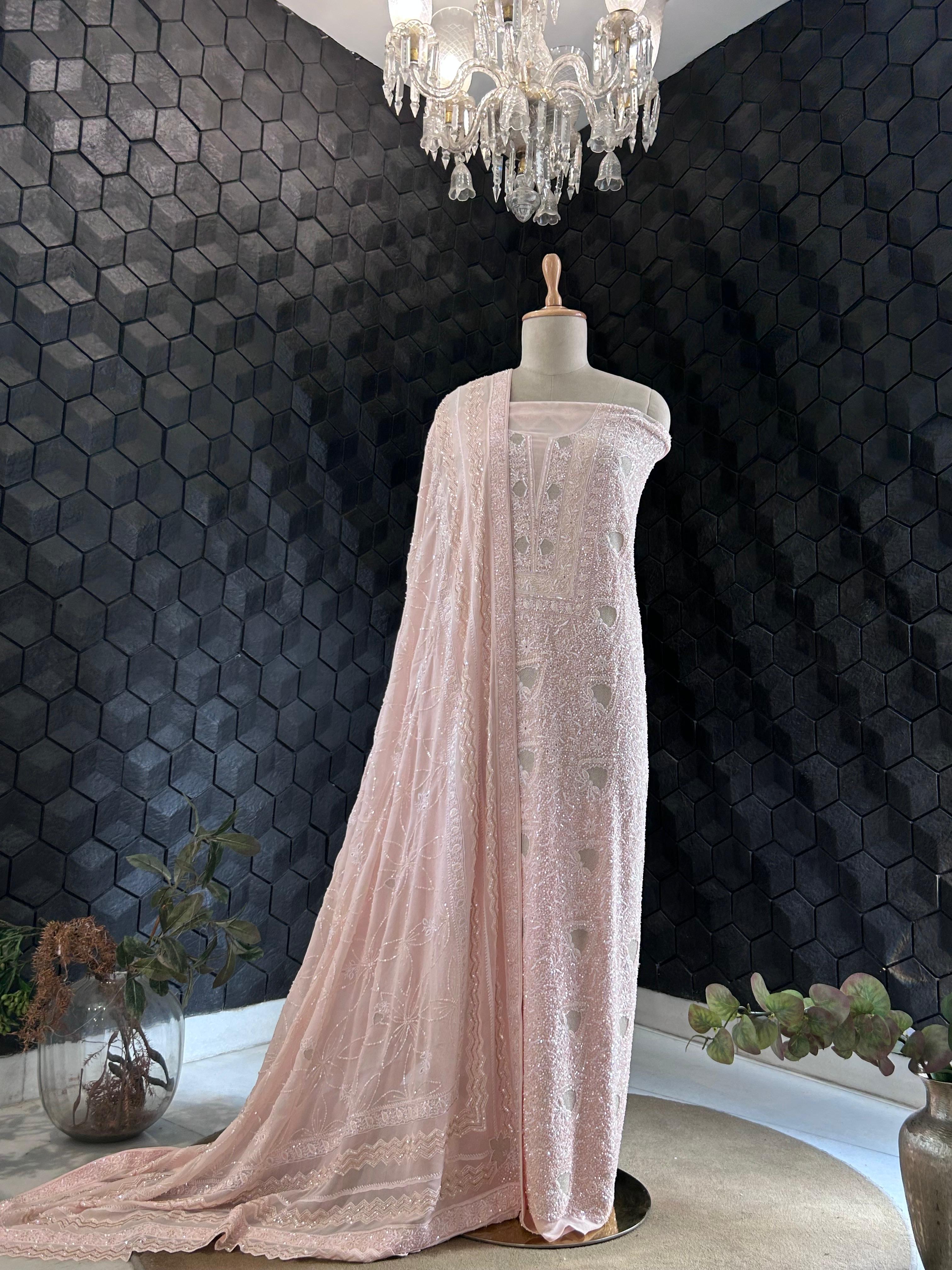 Peach georgette chikankari kurta set with statement jaal work