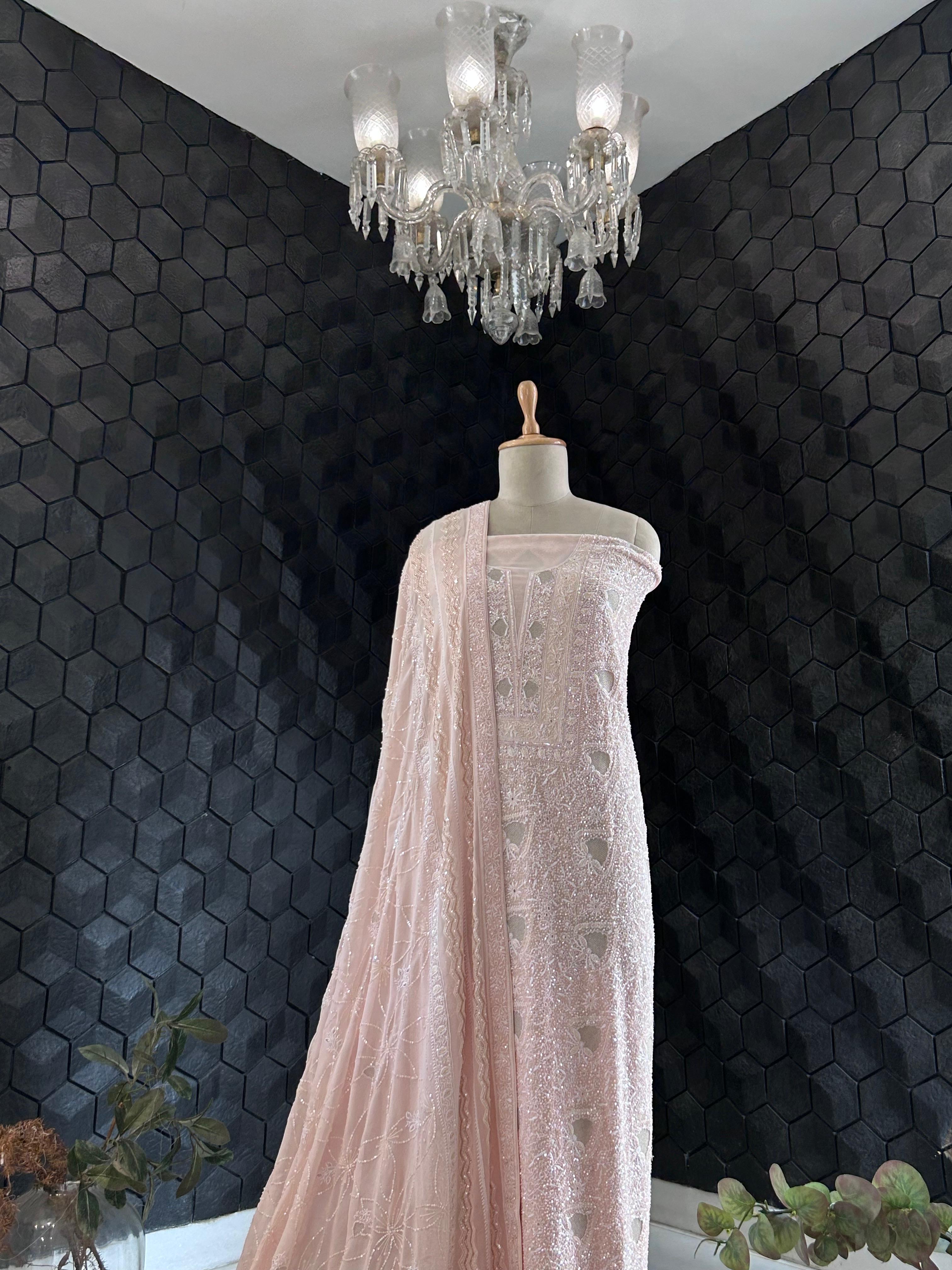 Peach georgette chikankari kurta set with statement jaal work