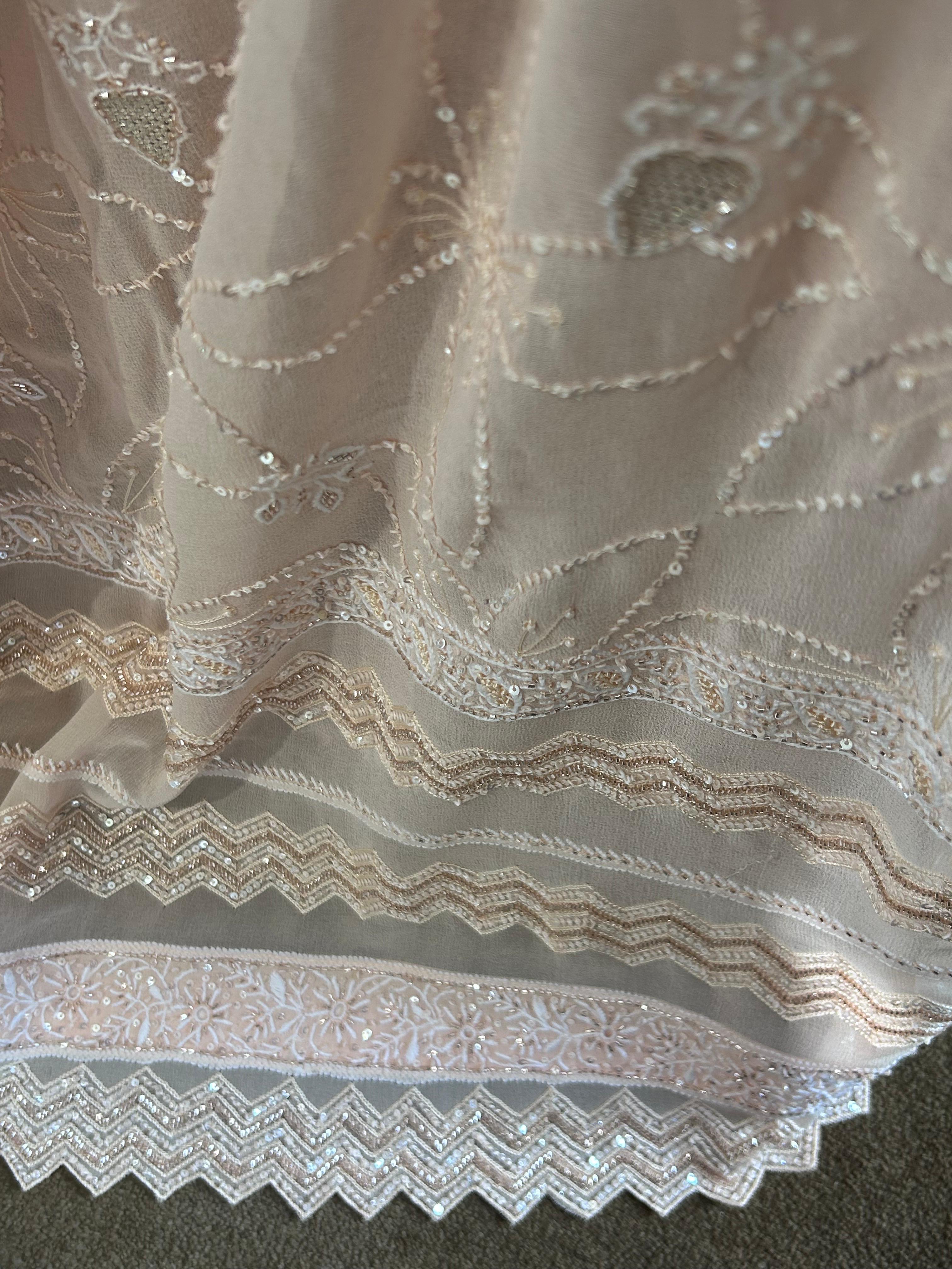 Peach georgette chikankari kurta set with statement jaal work