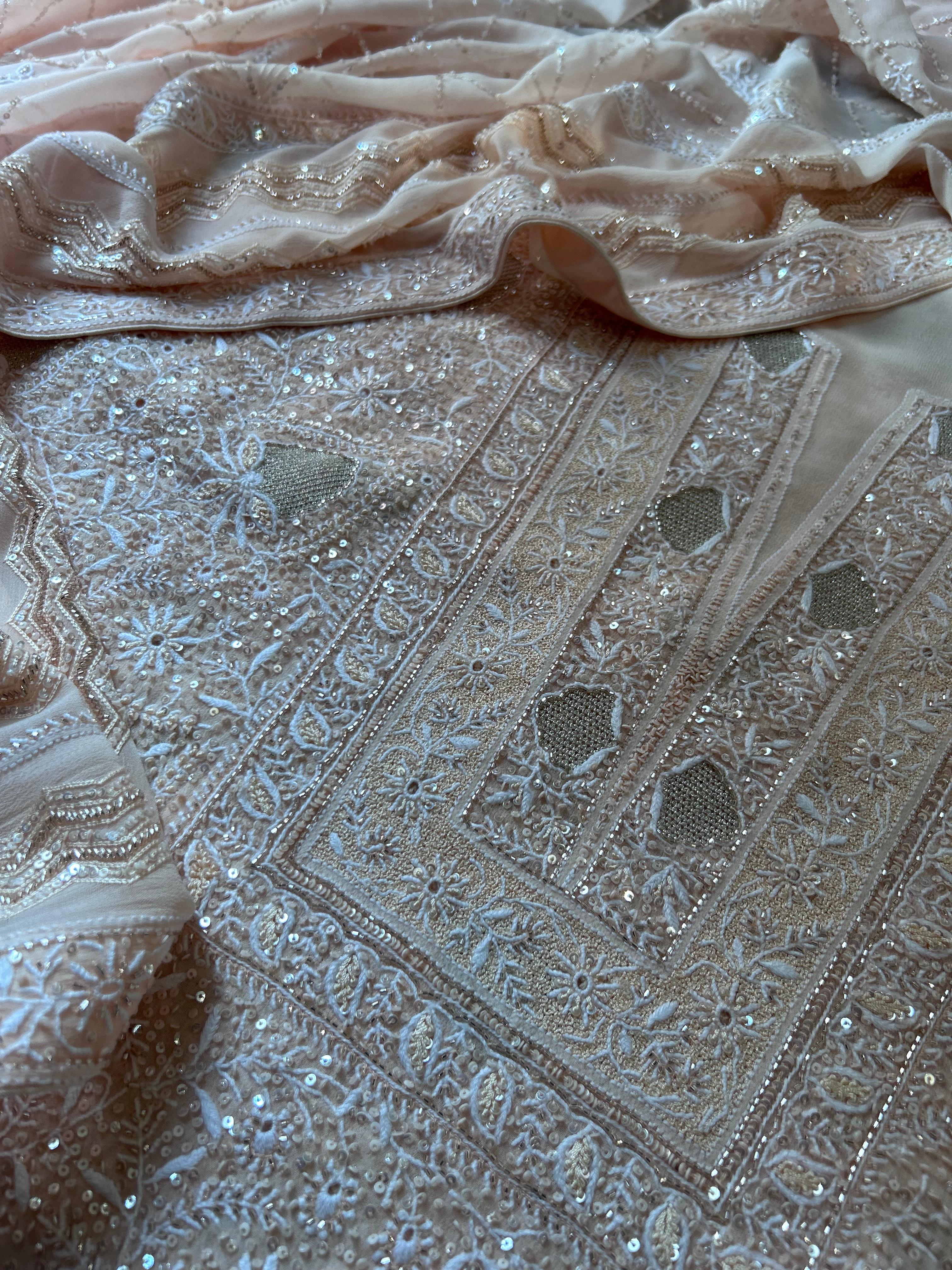 Peach georgette chikankari kurta set with statement jaal work