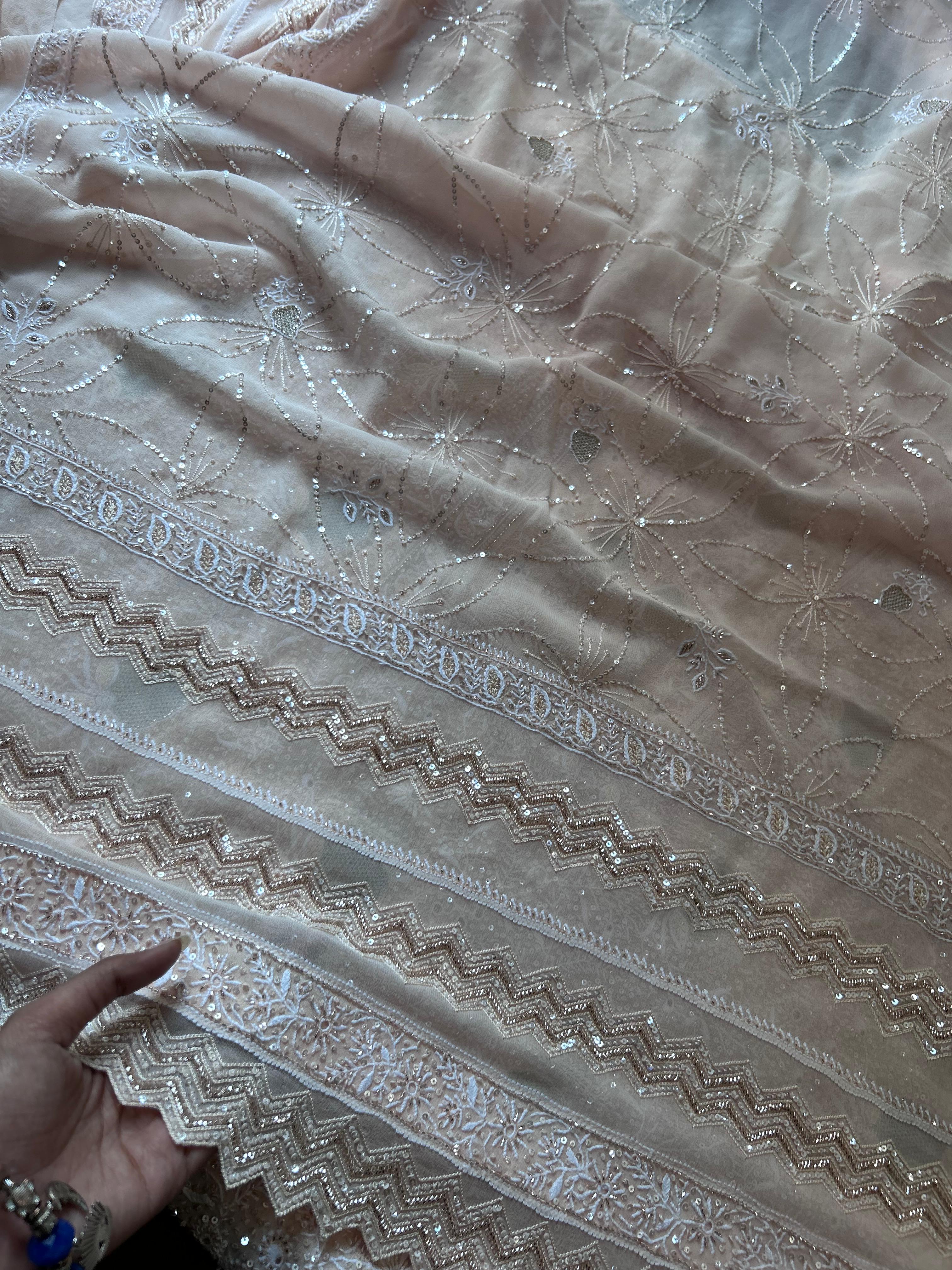 Peach georgette chikankari kurta set with statement jaal work