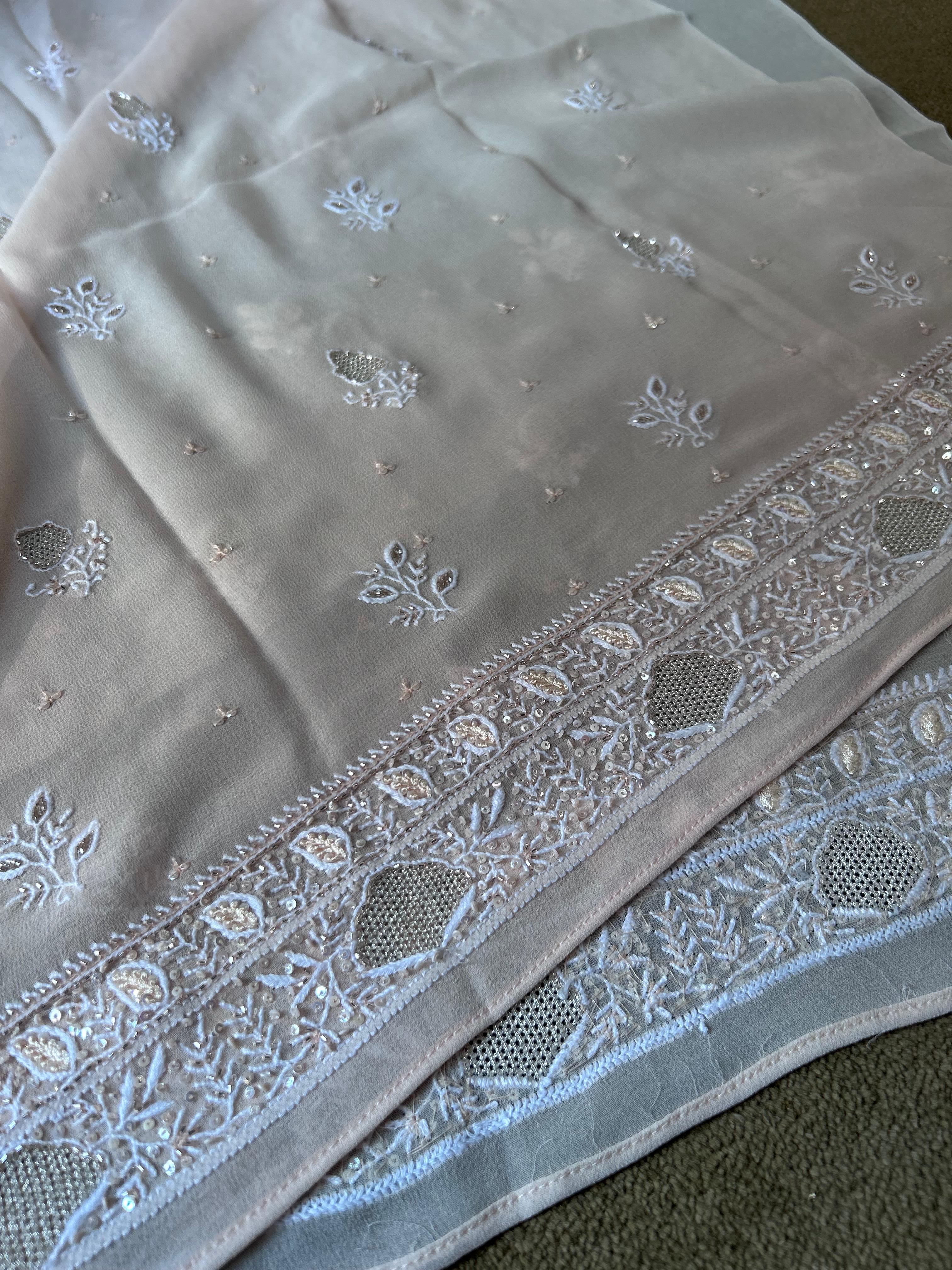 Peach georgette chikankari kurta set with statement jaal work