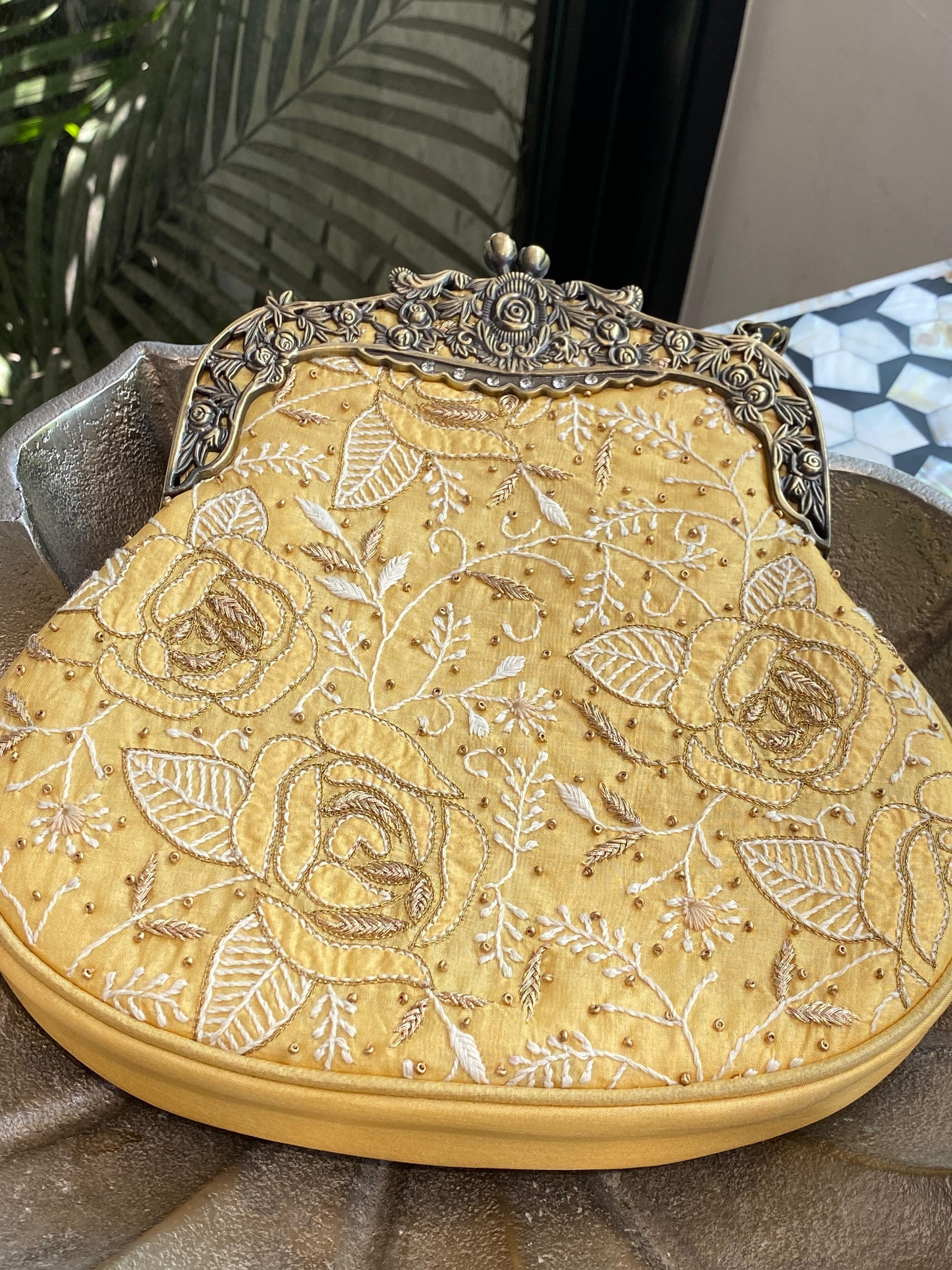 Yellow silk potli