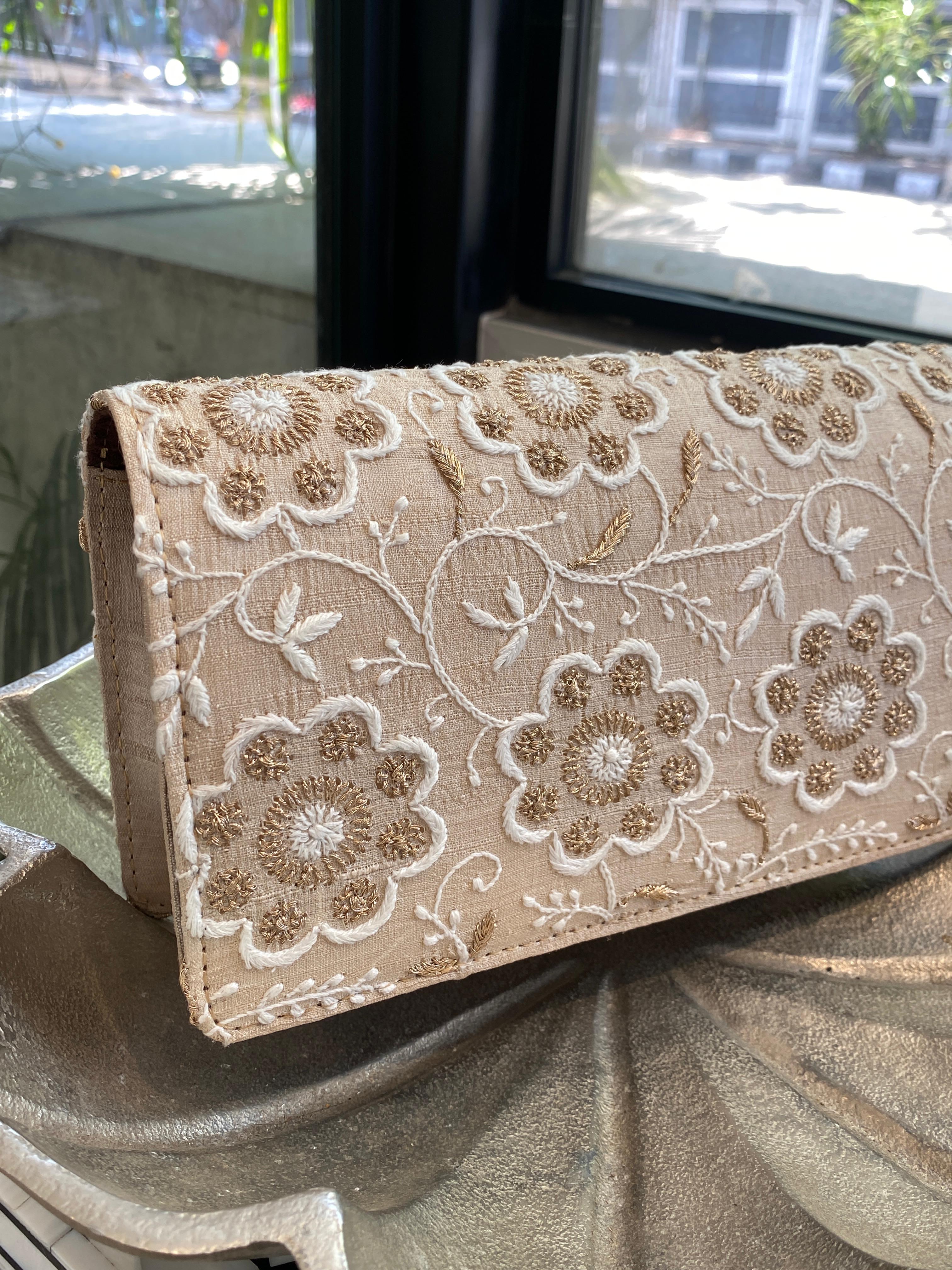 Beige silk clutch