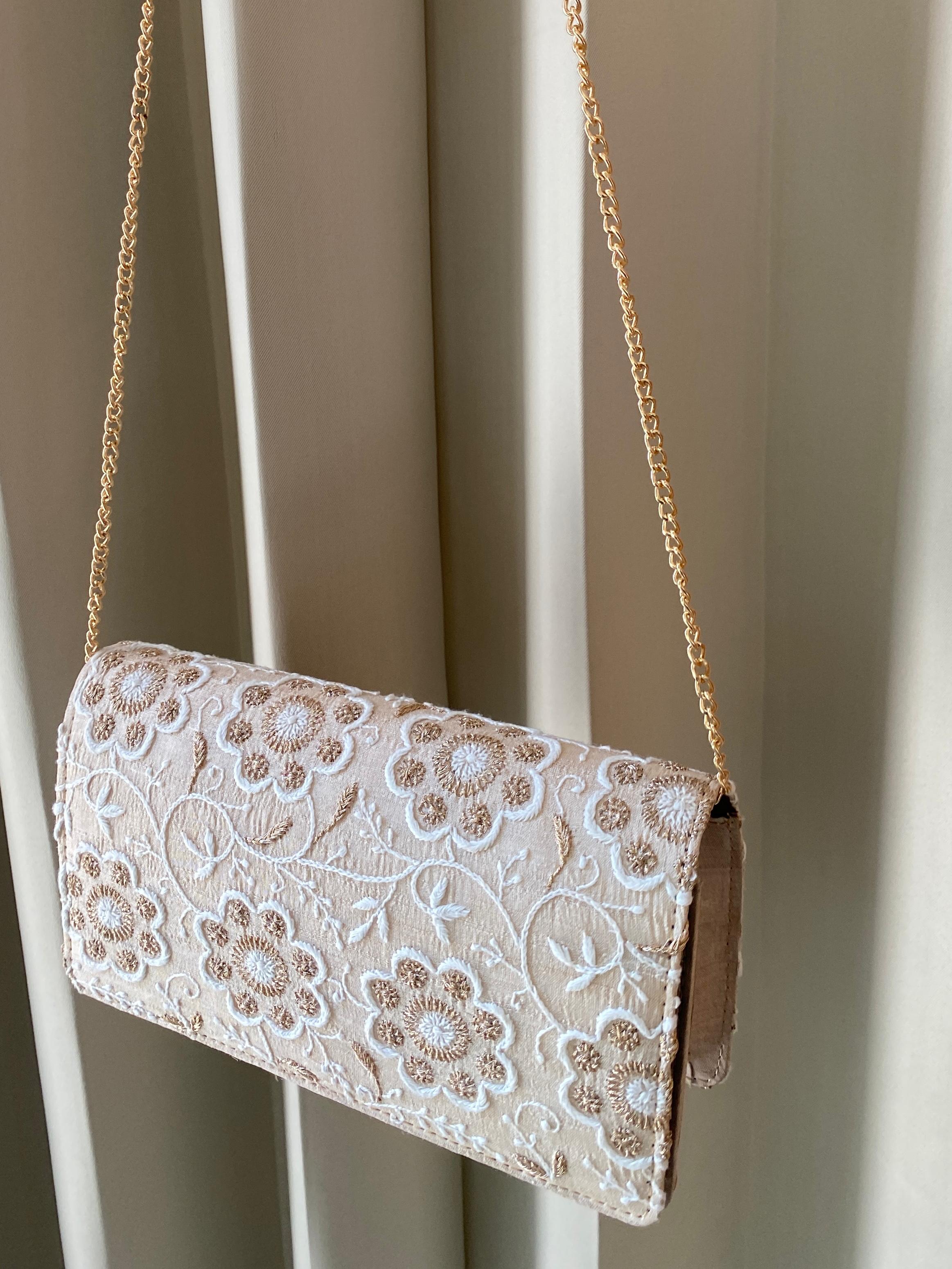 Beige silk clutch