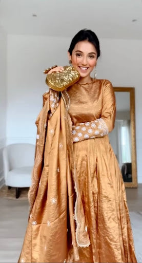 Masoom Minawala in Zari Tissue Copper Anarkali Set with Aari and Chikankari