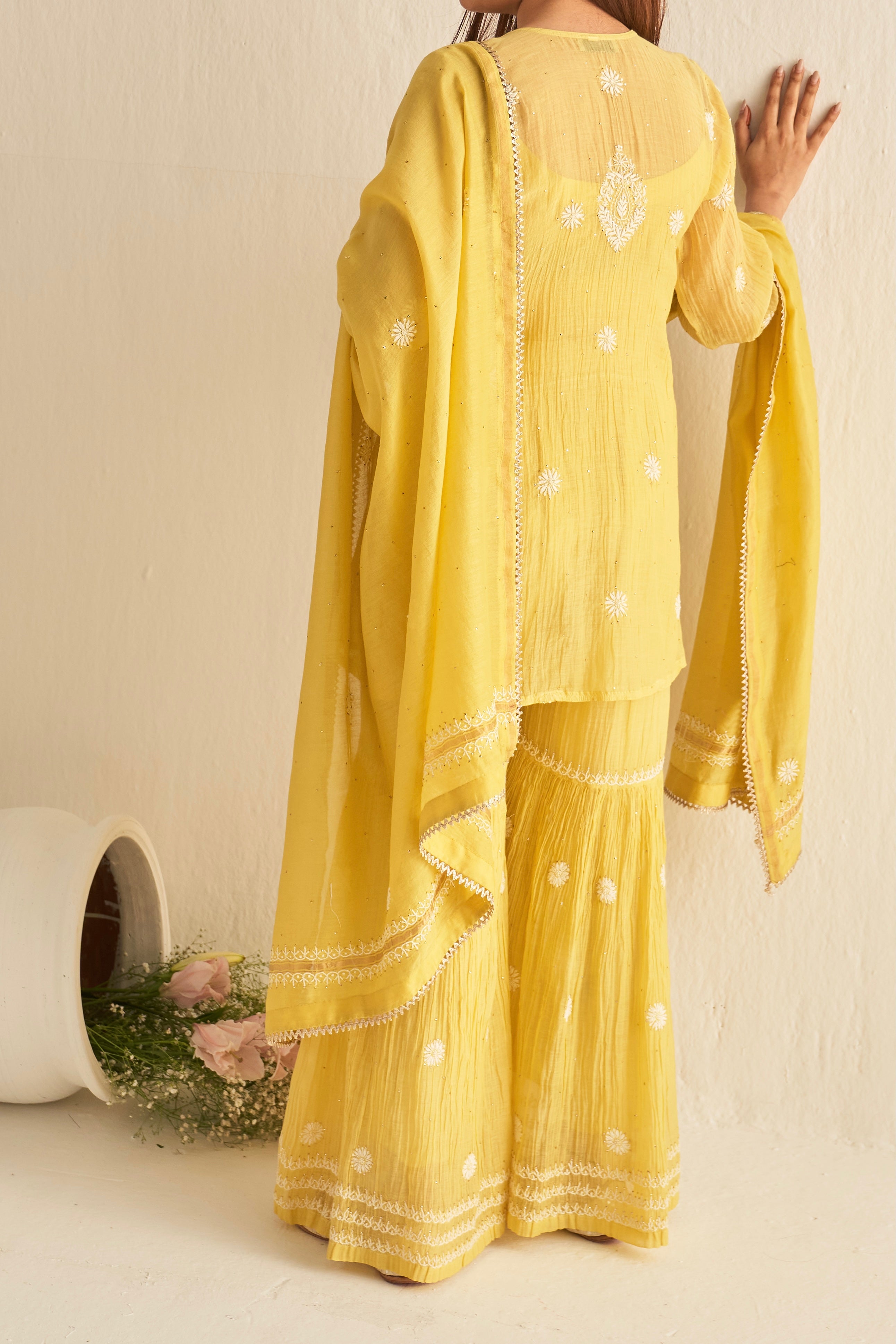 Yellow mul chanderi sharara set with mukaish and chikankari work