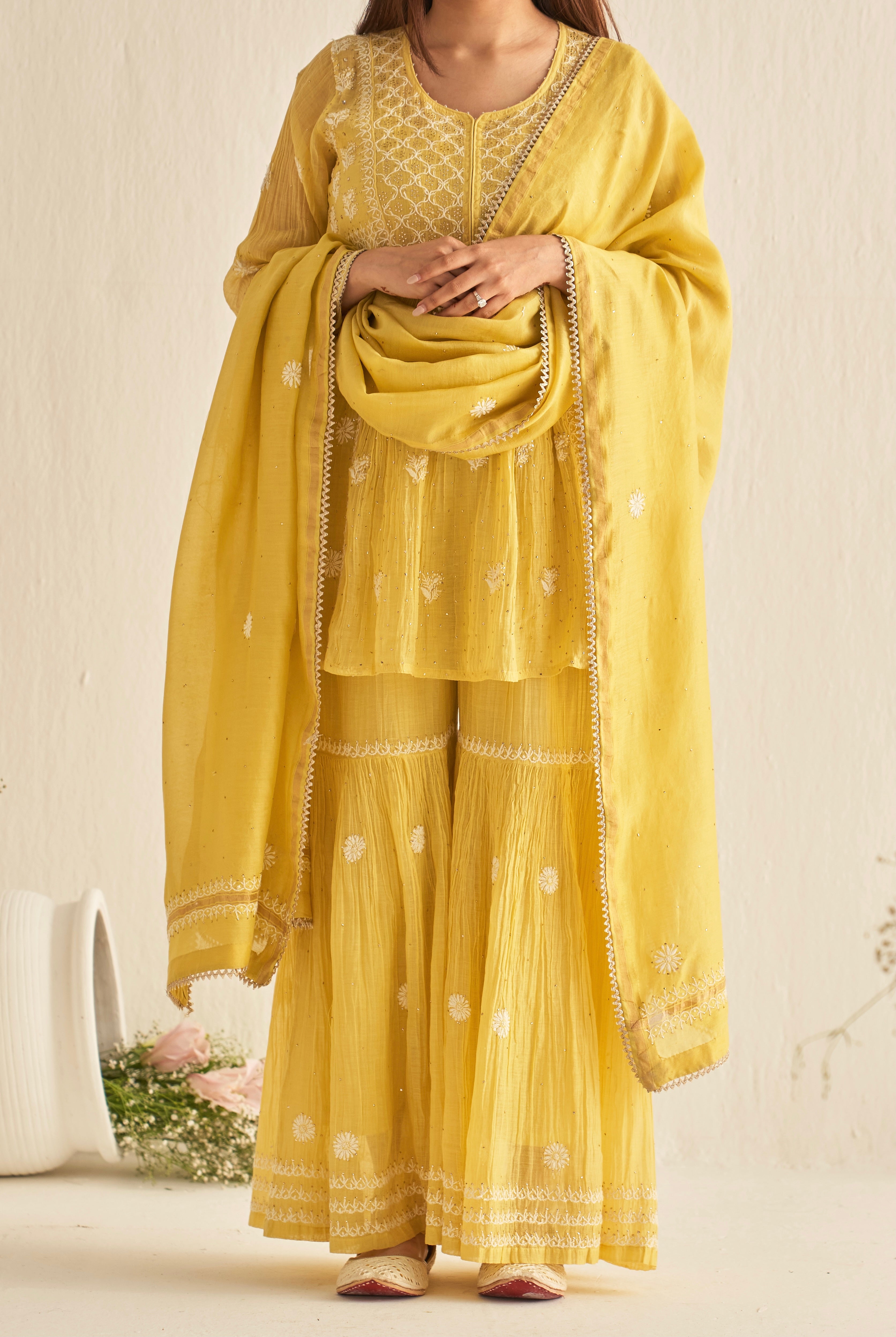 Yellow mul chanderi sharara set with mukaish and chikankari work