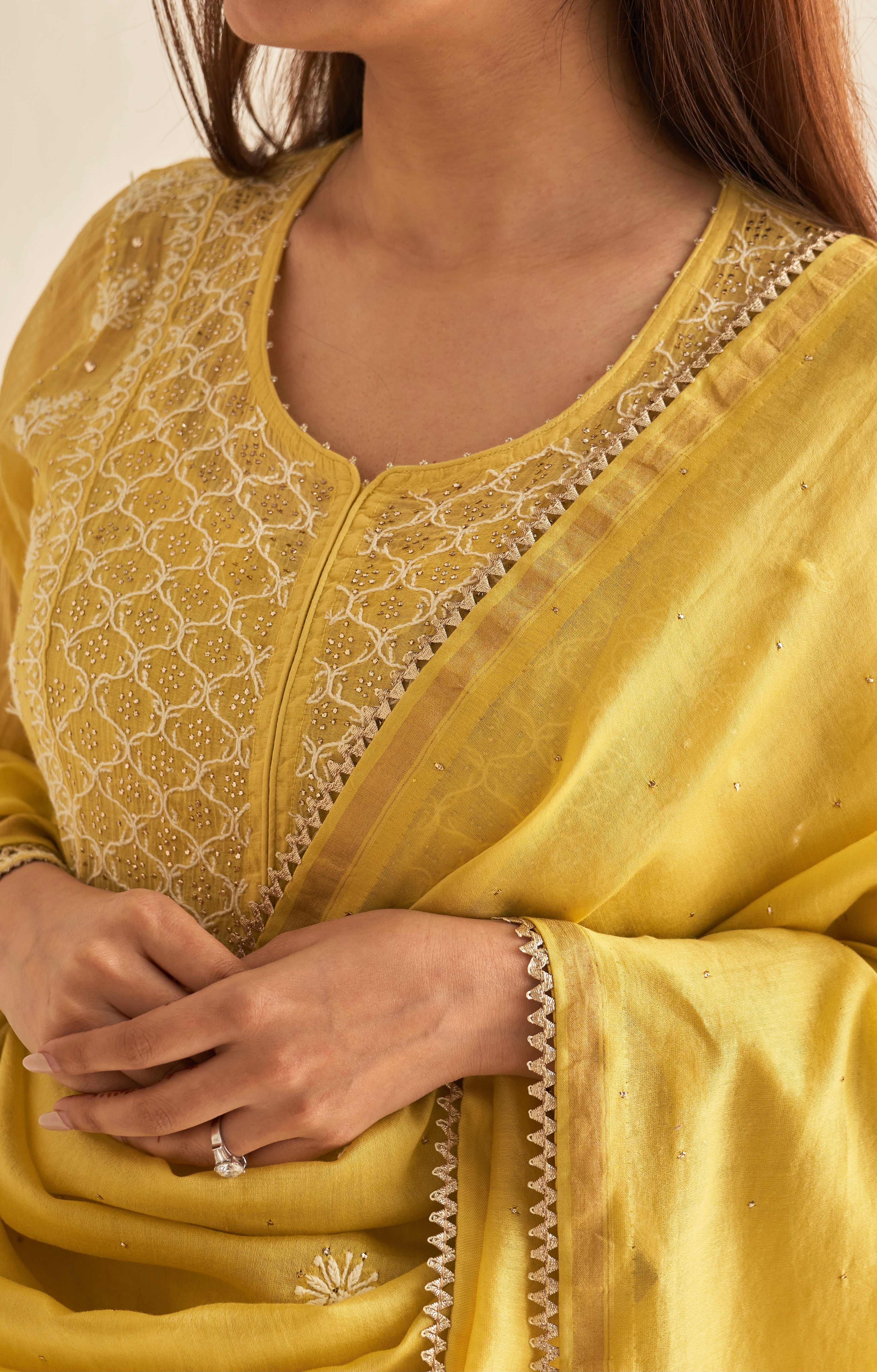 Yellow mul chanderi sharara set with mukaish and chikankari work