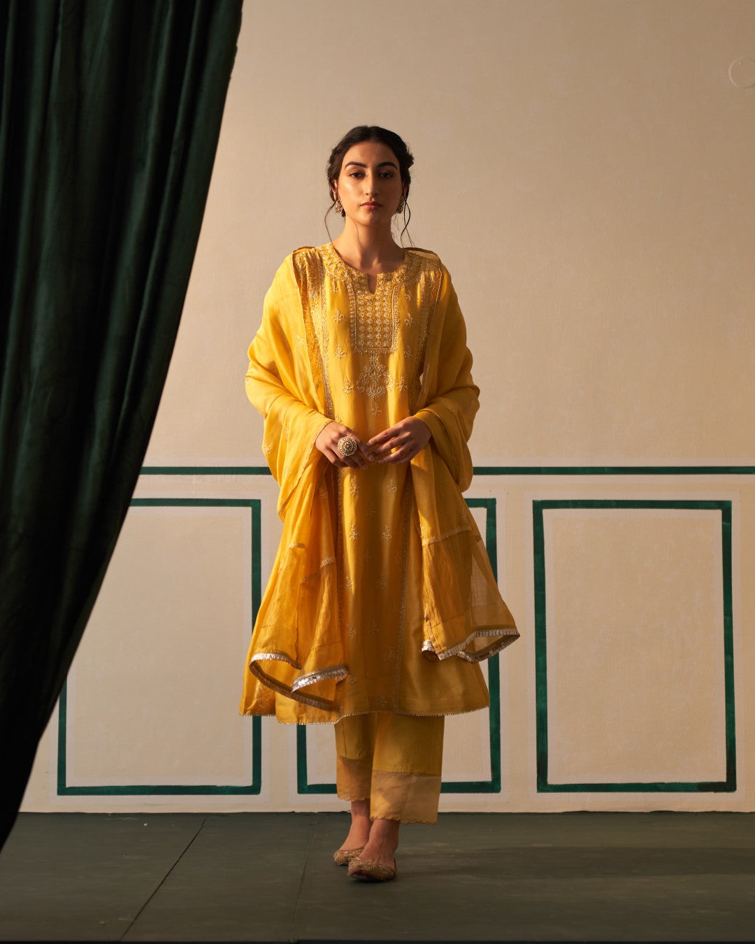 Mustard Chanderi Anarkali with heavy front and back work