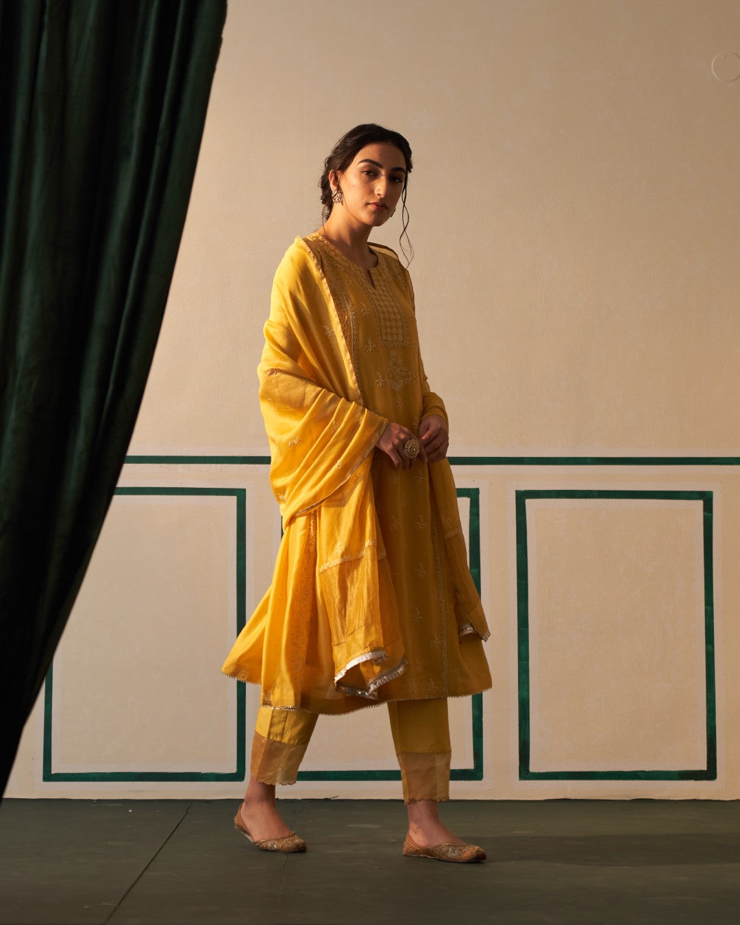 Mustard Chanderi Anarkali with heavy front and back work