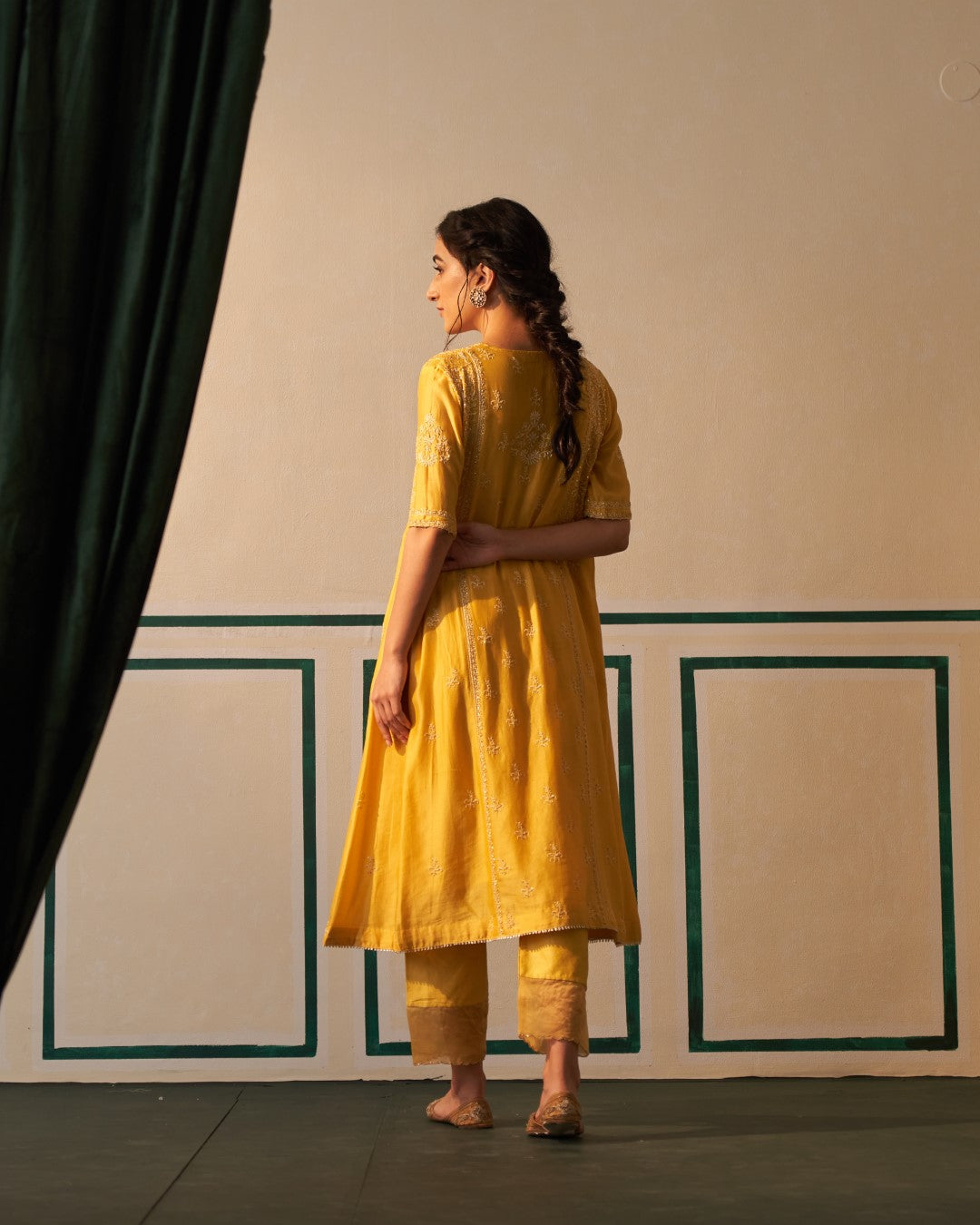 Mustard Chanderi Anarkali with heavy front and back work
