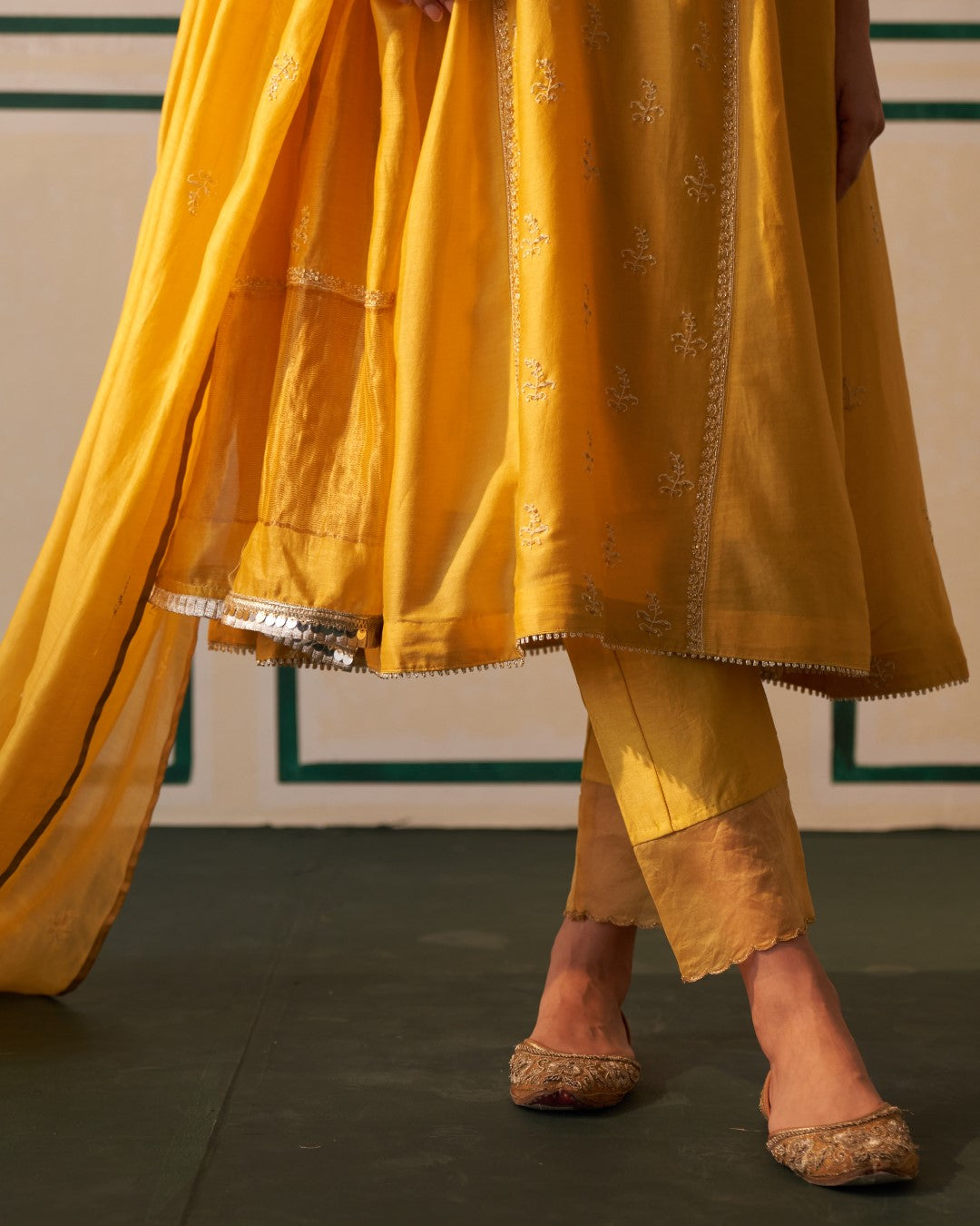 Mustard Chanderi Anarkali with heavy front and back work