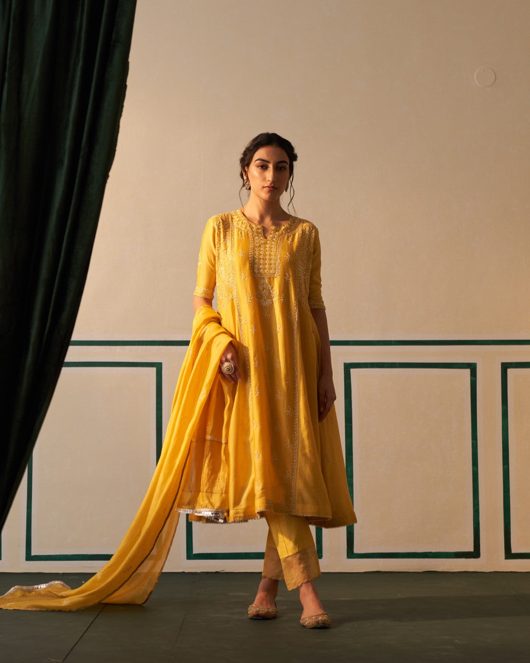 Mustard Chanderi Anarkali with heavy front and back work