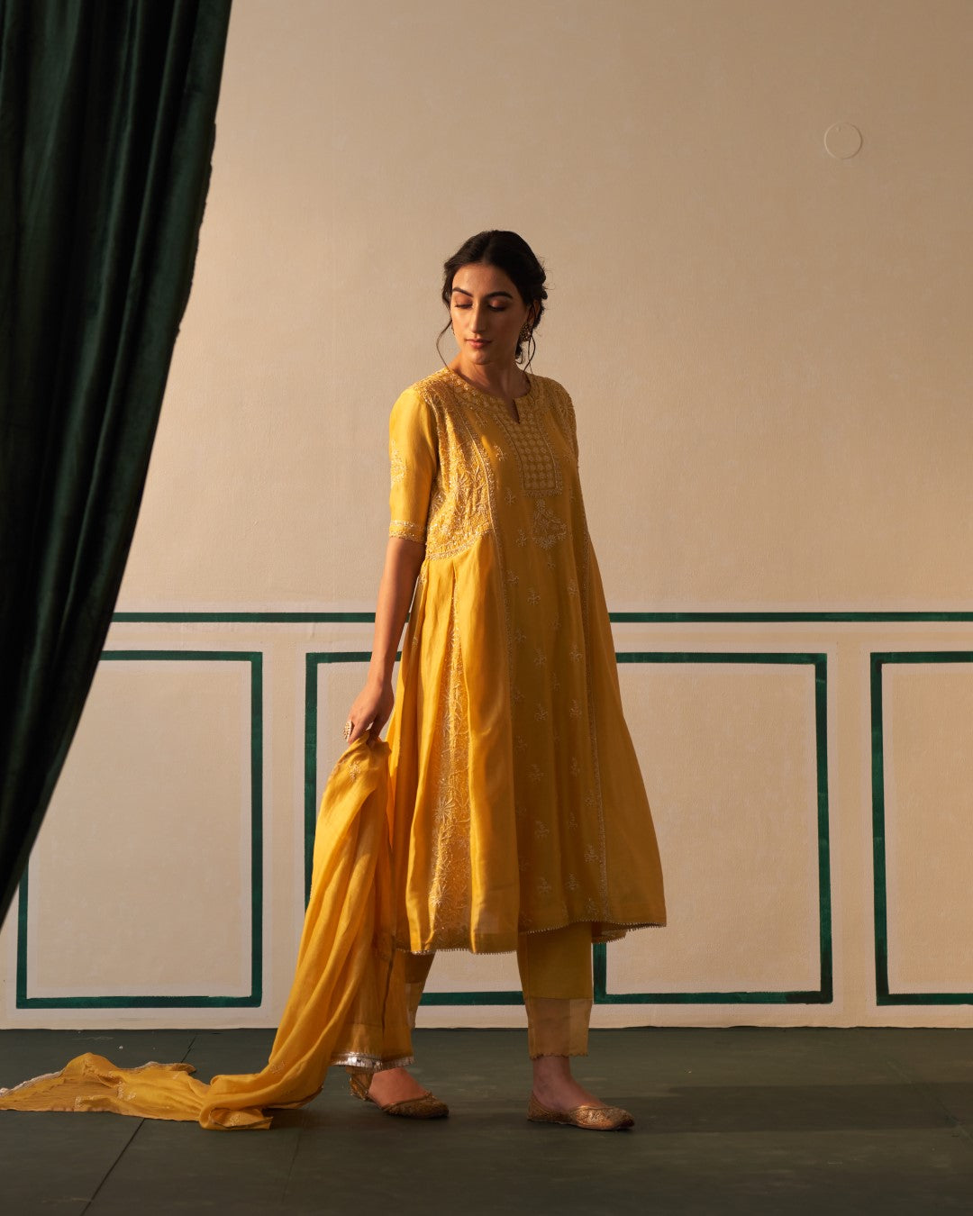 Mustard Chanderi Anarkali with heavy front and back work