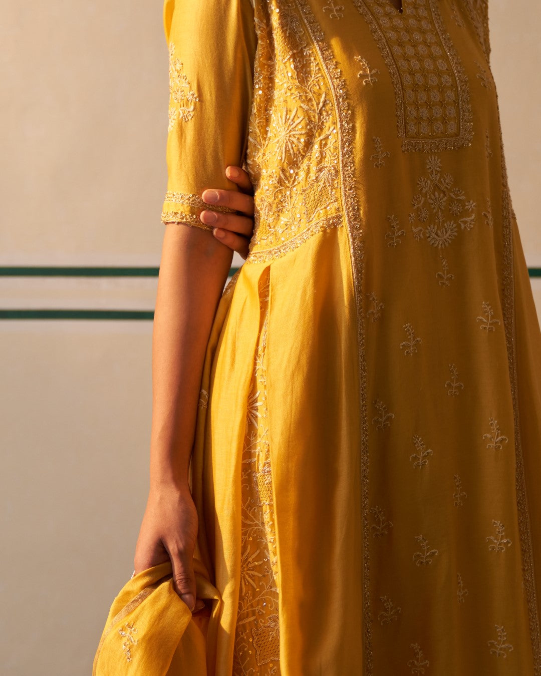 Mustard Chanderi Anarkali with heavy front and back work