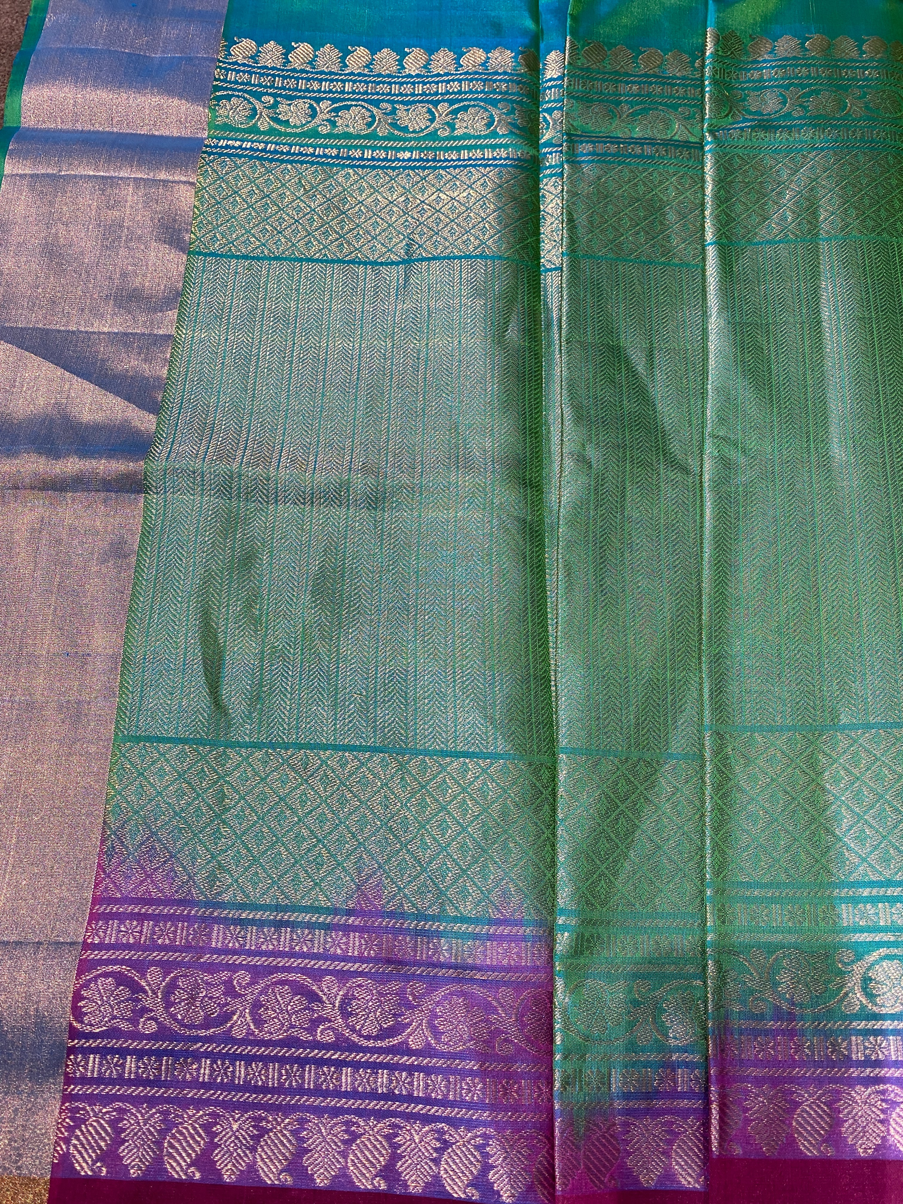 Violet silk saree with golden zari border