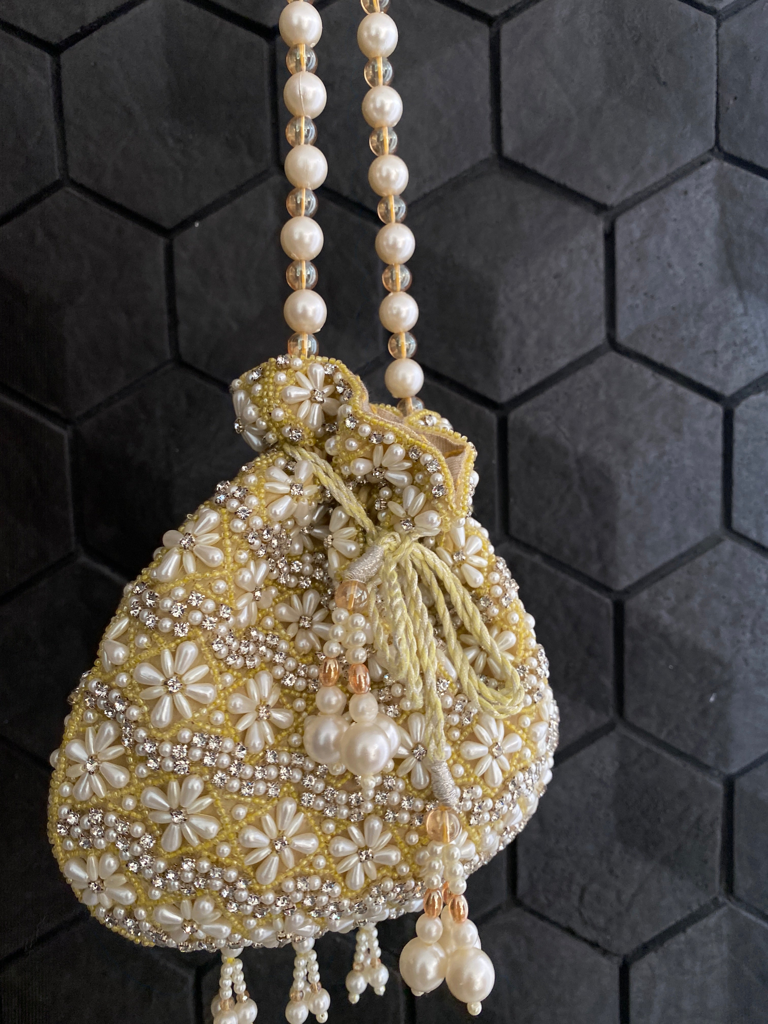 WHITE AND YELLOW PEARL EMBELLISHED POTLI BAG