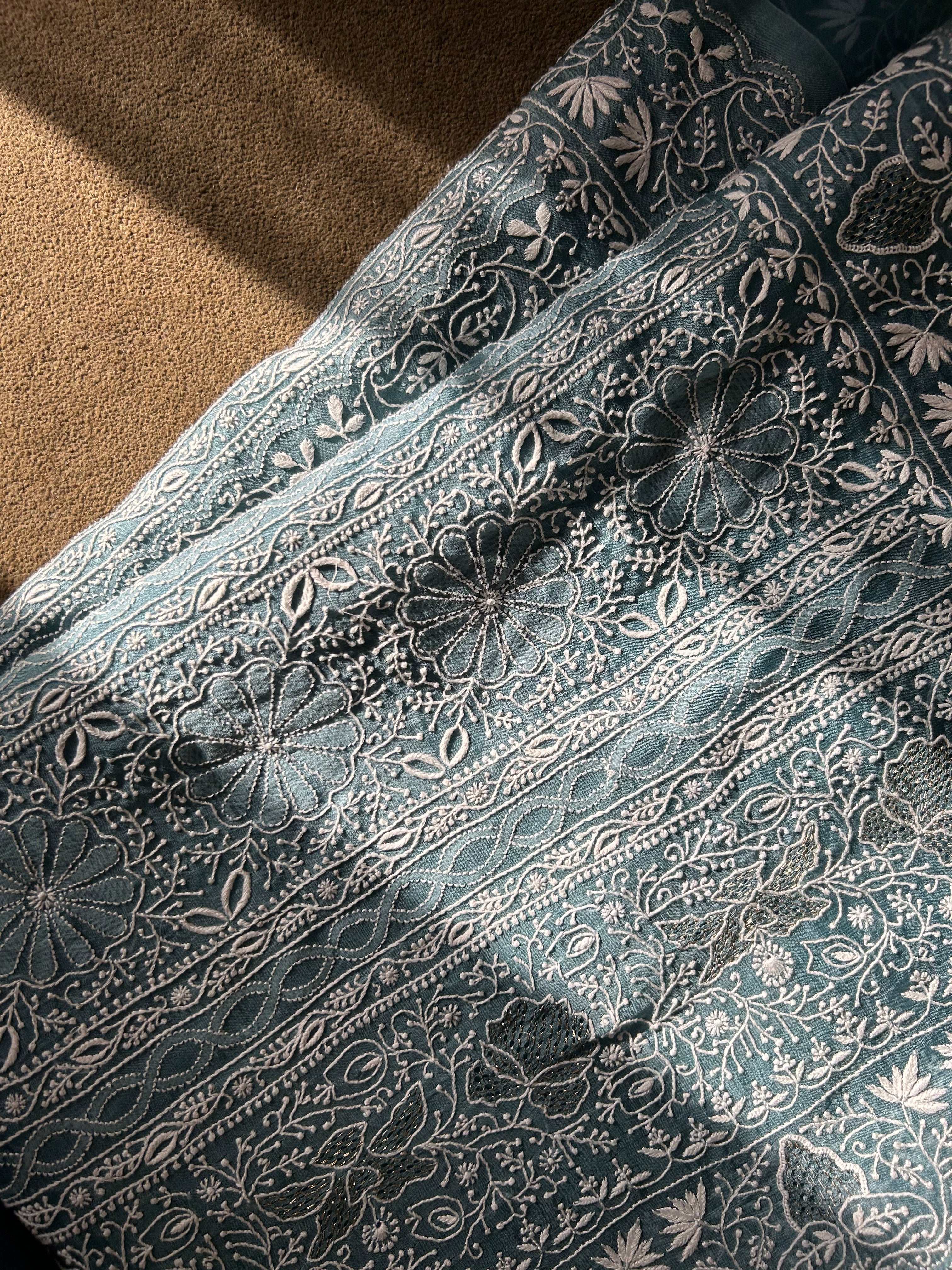 Exclusive Teal Blue Organza Chikankari Saree with statement paan boota