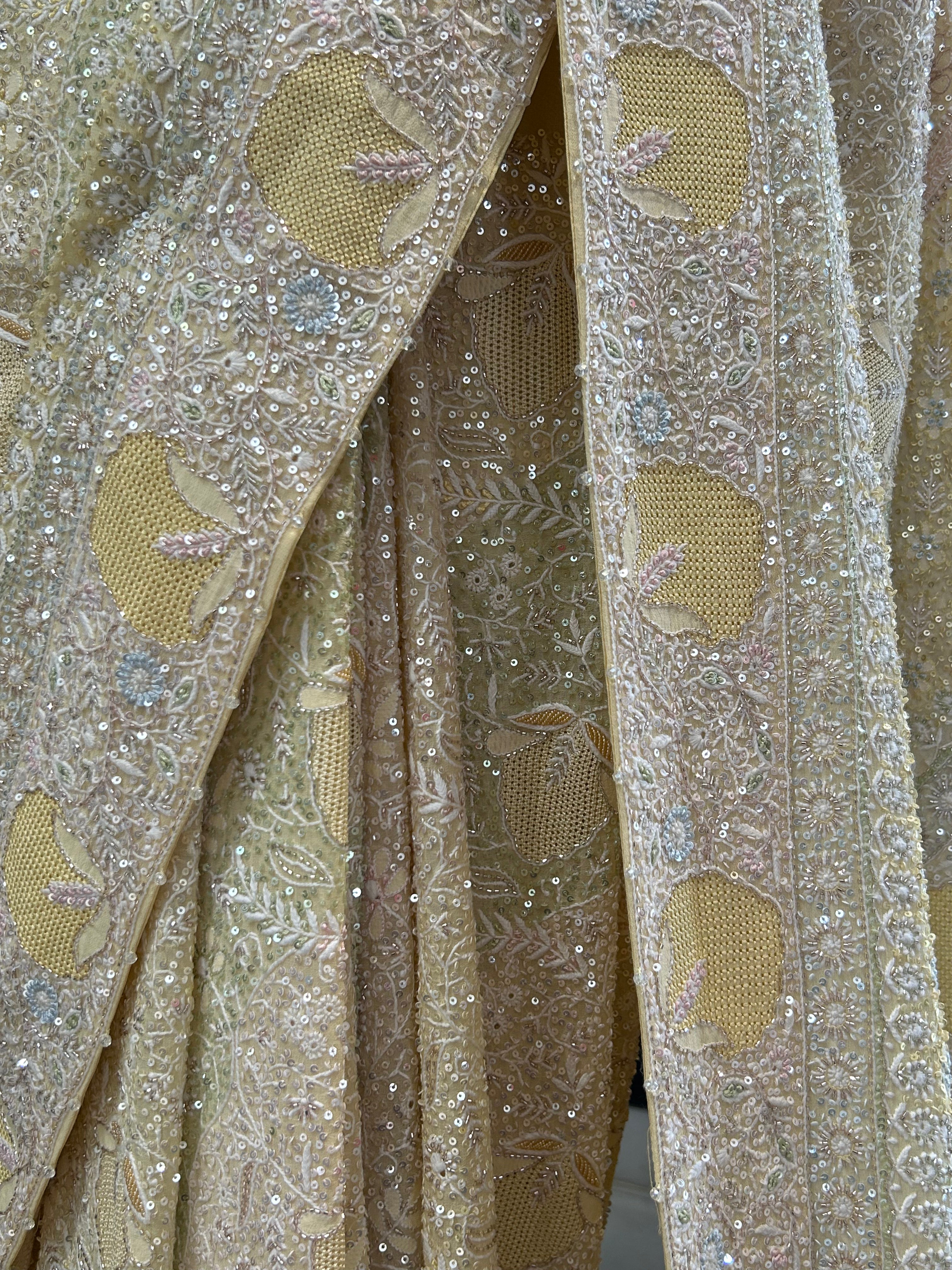 Premium Yellow Georgette saree with statement jaal work