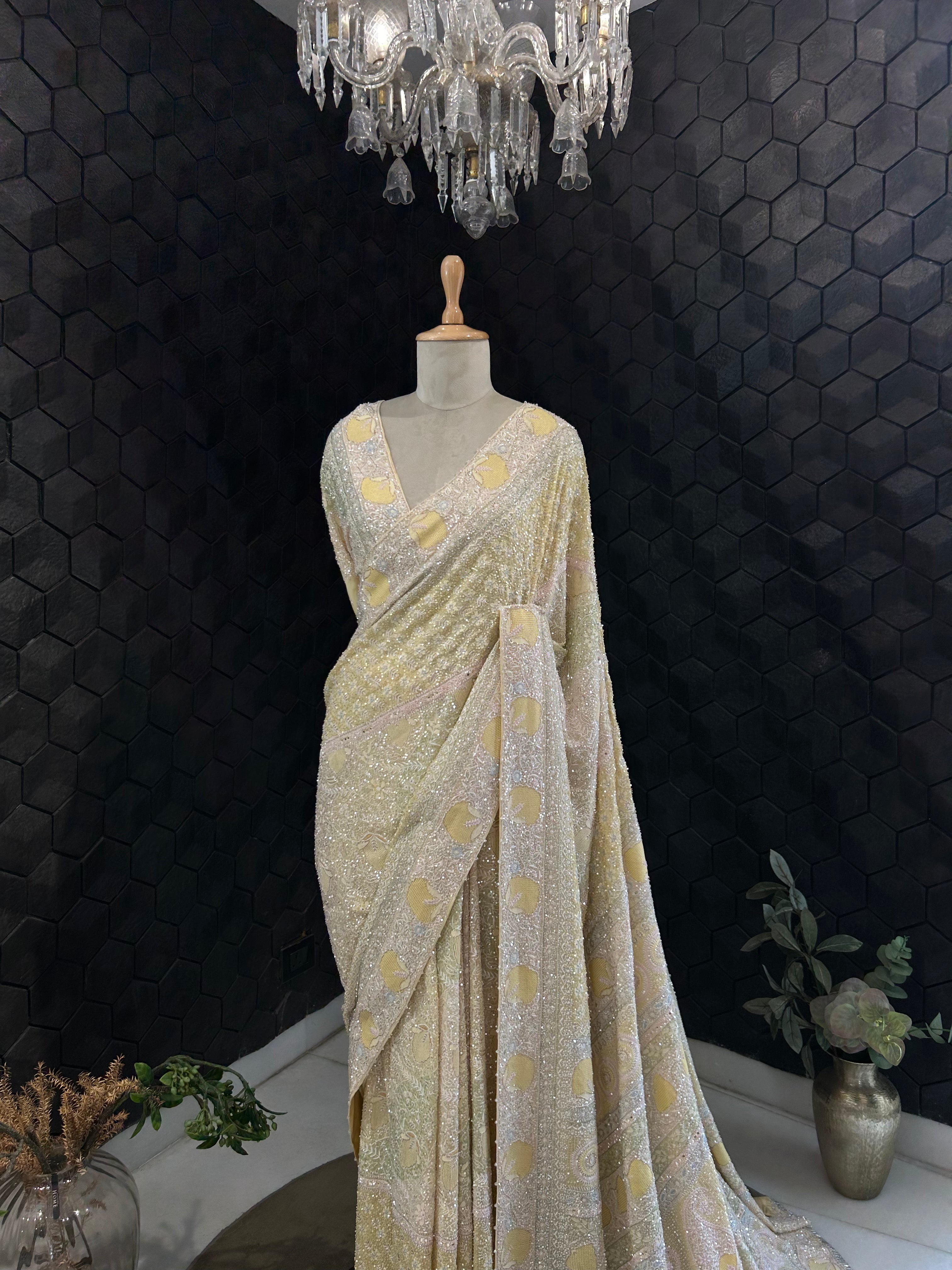 Premium Yellow Georgette saree with statement jaal work