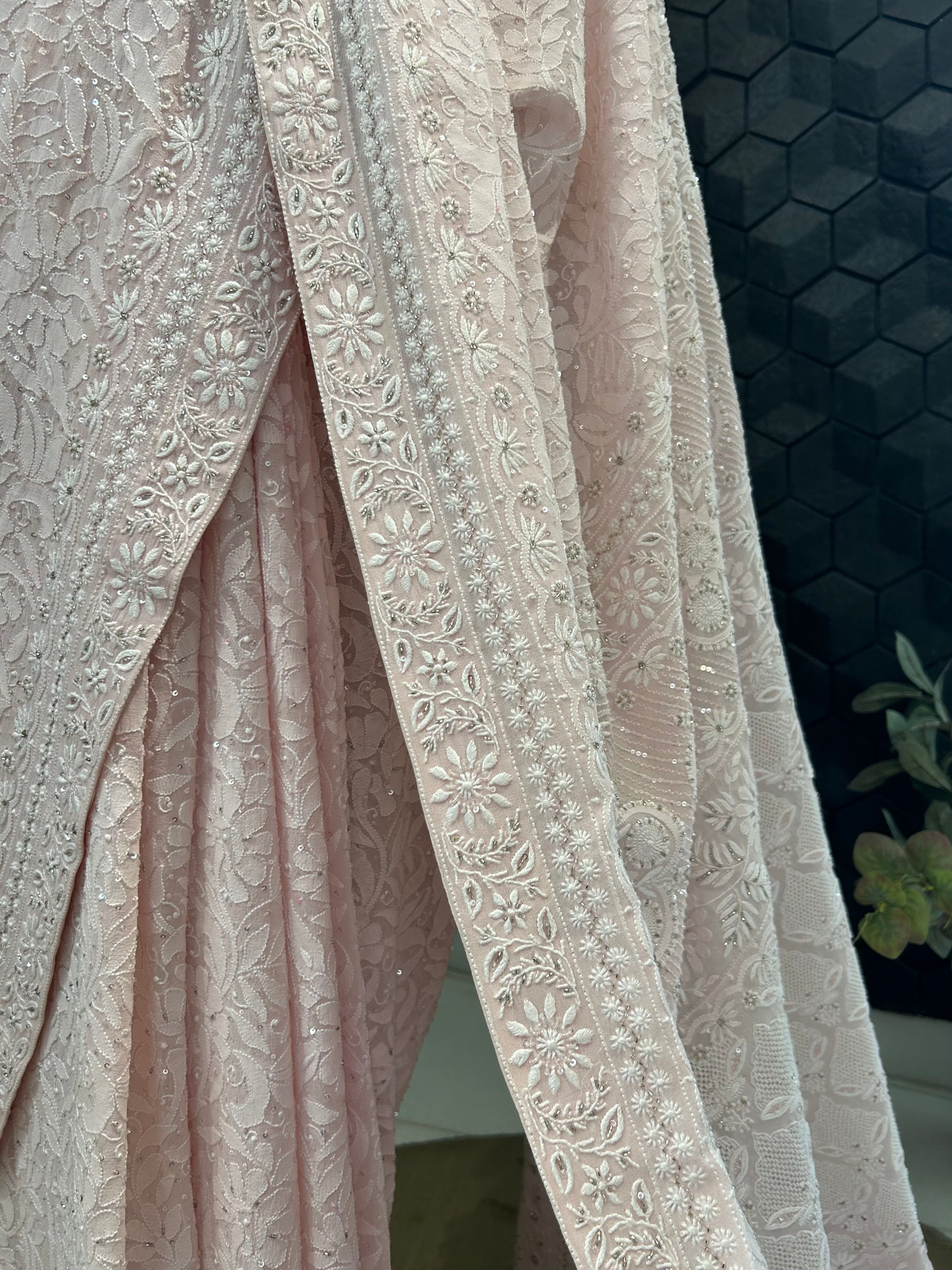 Premium Pink Georgette chikankari saree with statement heavy jaal