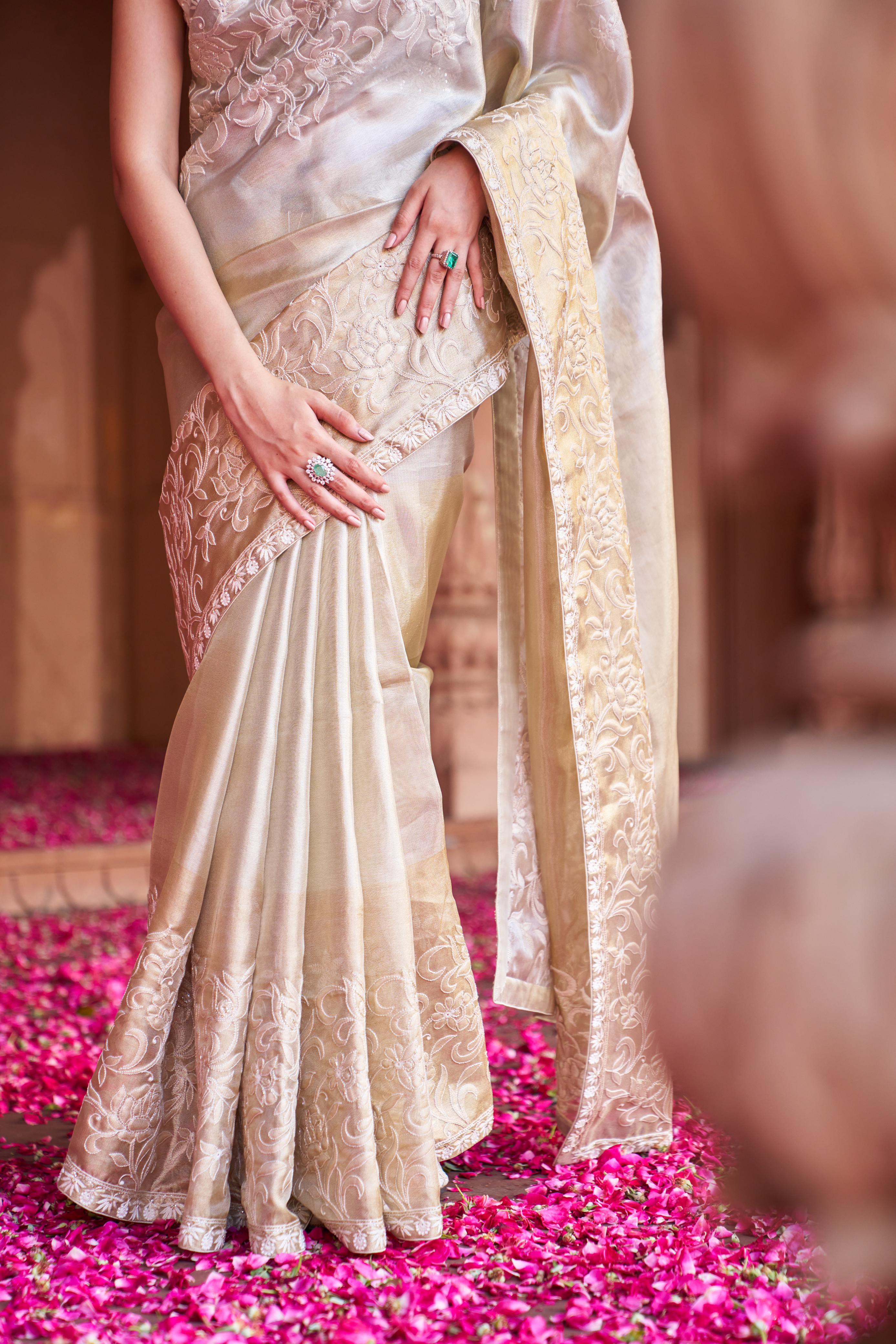 Gold Tissue Chikankari Saree with statement lotus design