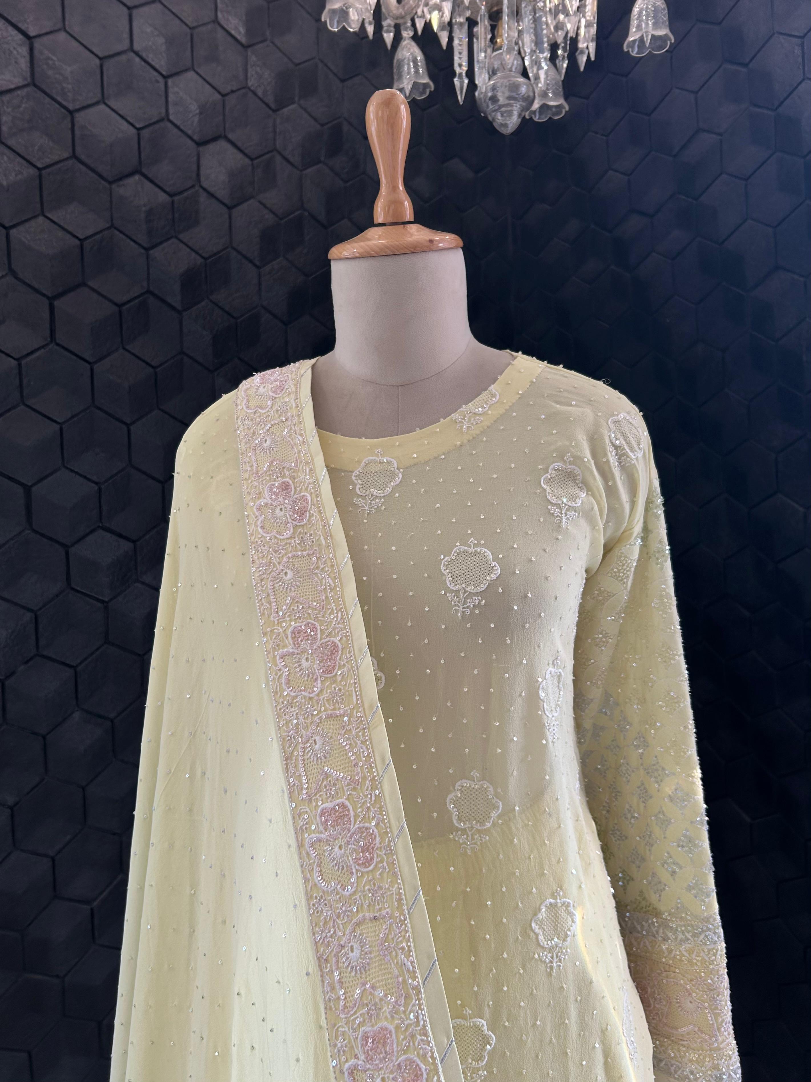 Yellow Georgette ek - taar chikankari sharara set