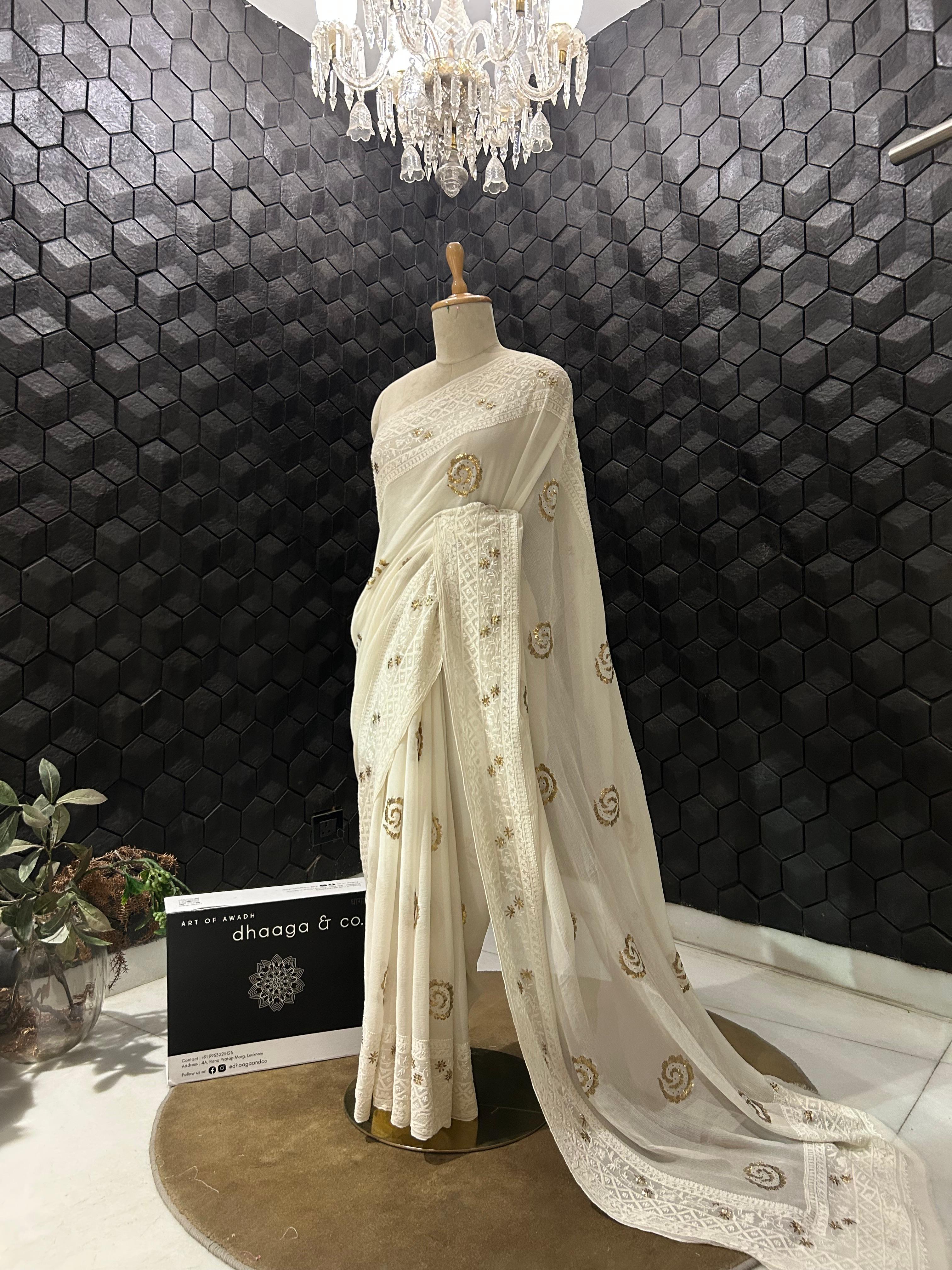 White chiffon chikankari and pitta border saree