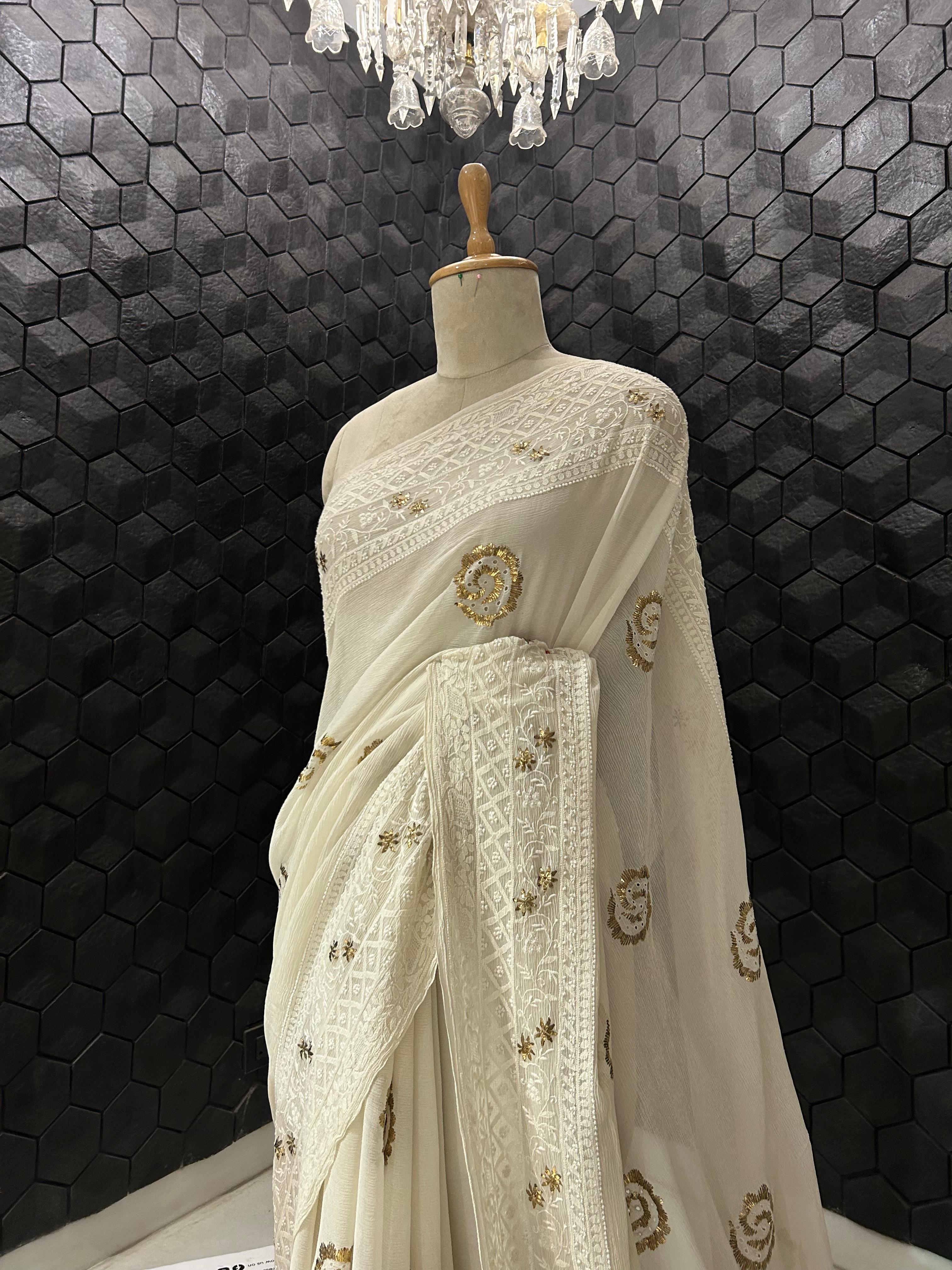 White chiffon chikankari and pitta border saree