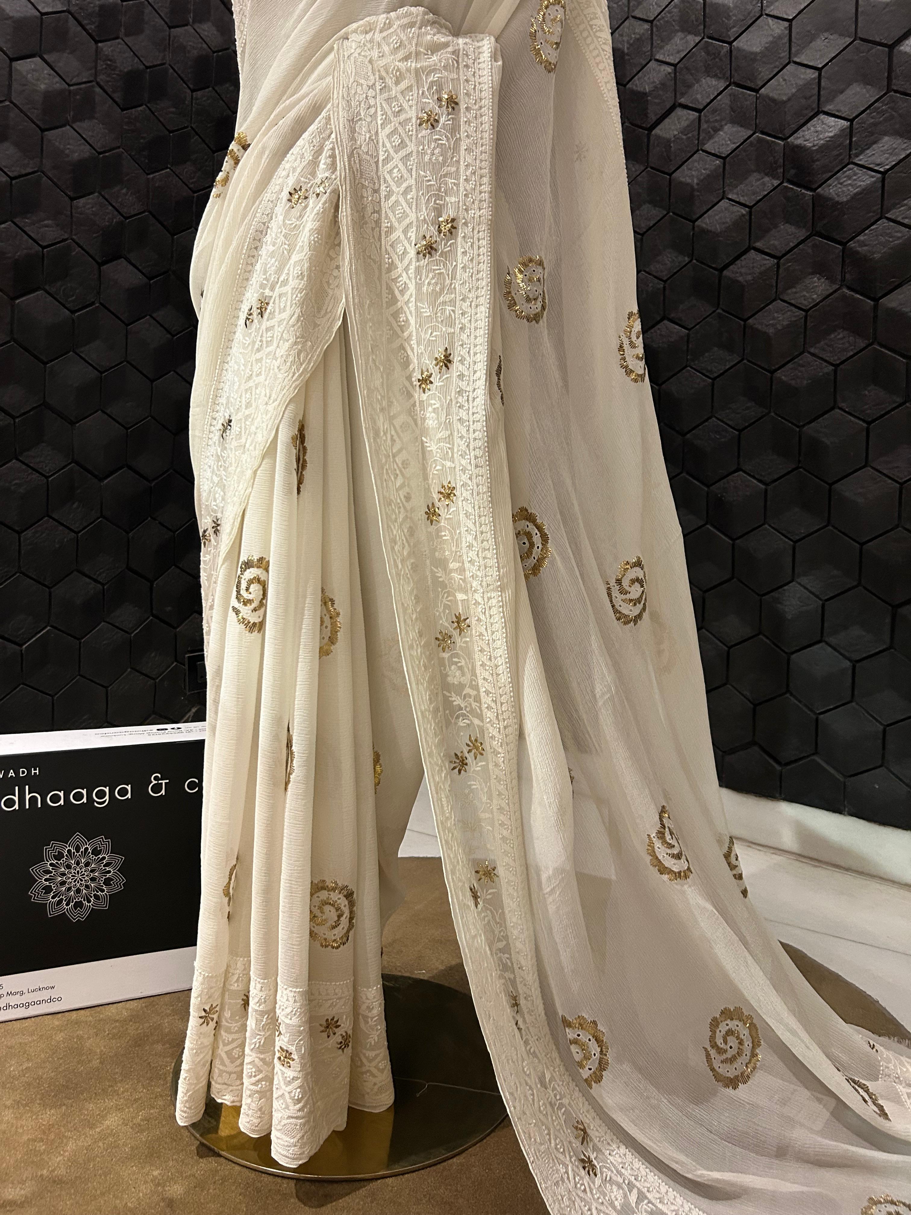 White chiffon chikankari and pitta border saree