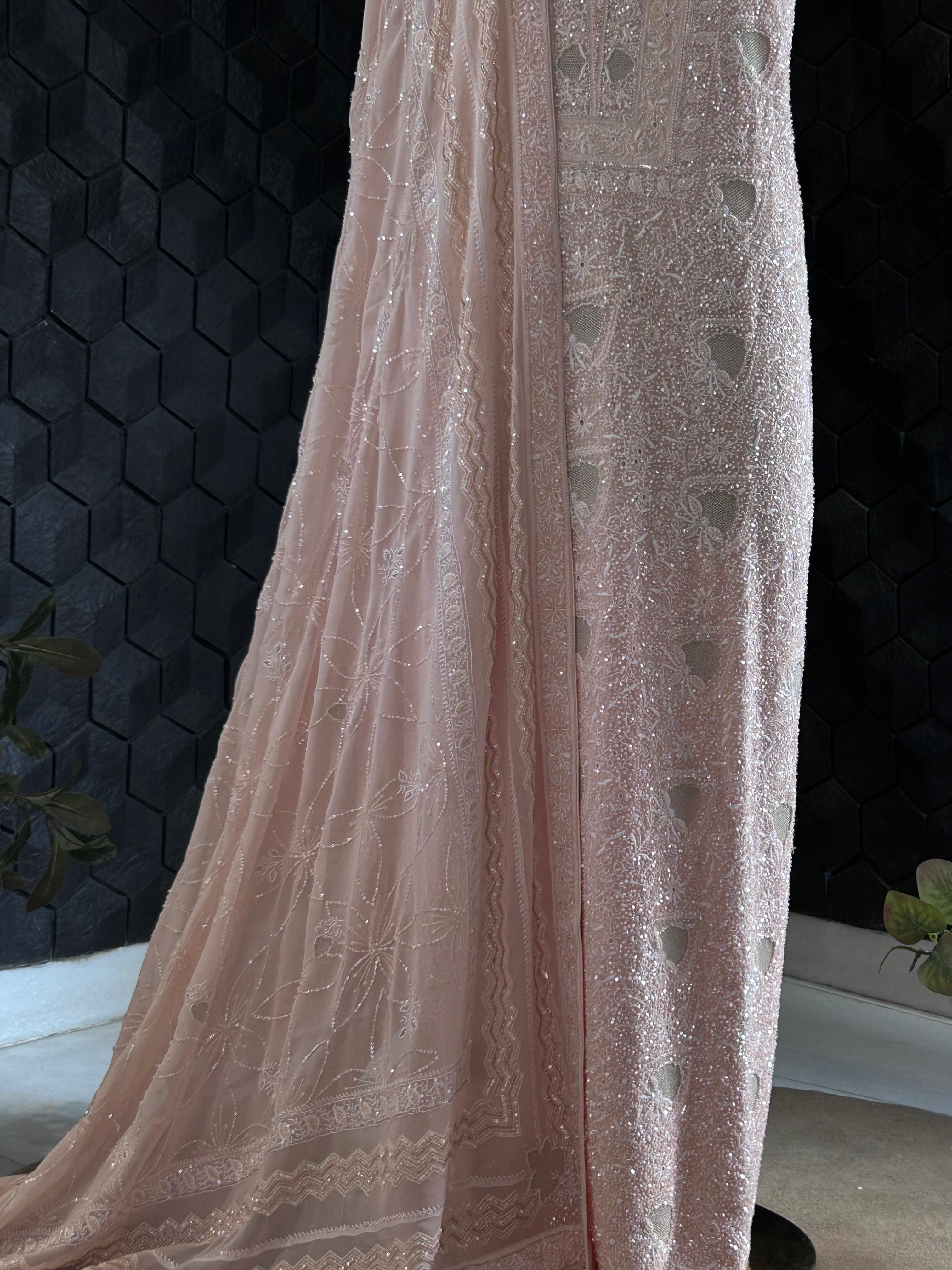 Peach georgette chikankari kurta set with statement jaal work