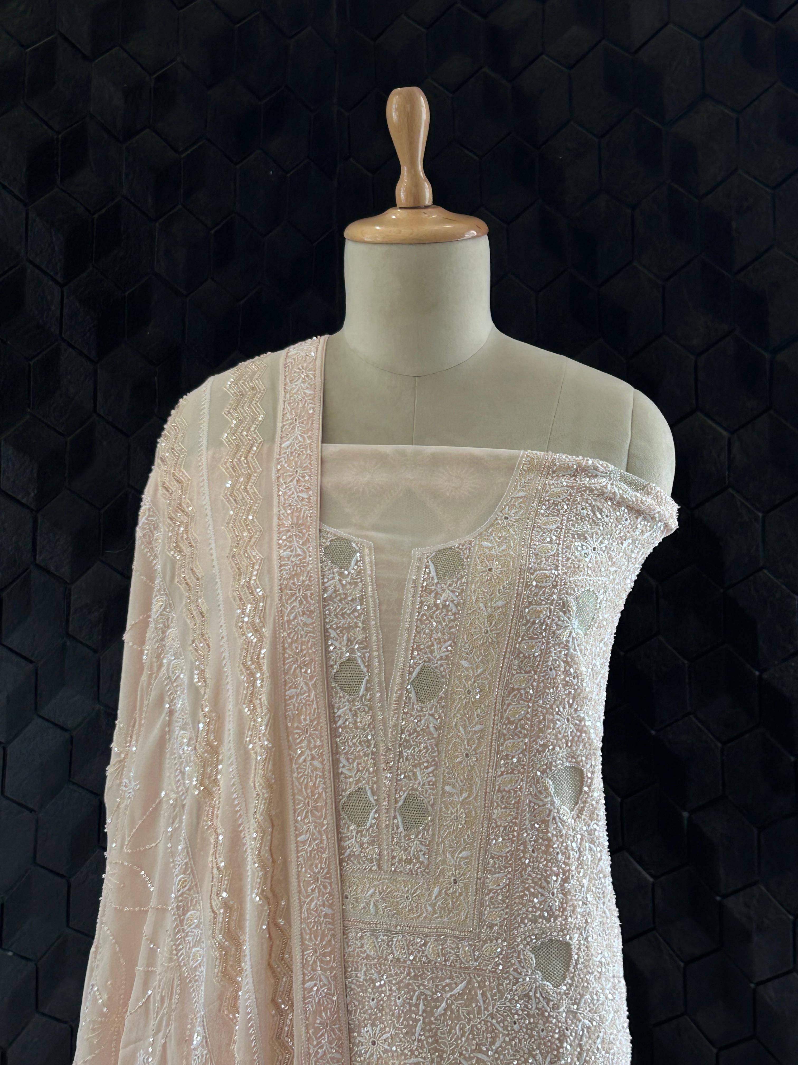 Peach georgette chikankari kurta set with statement jaal work