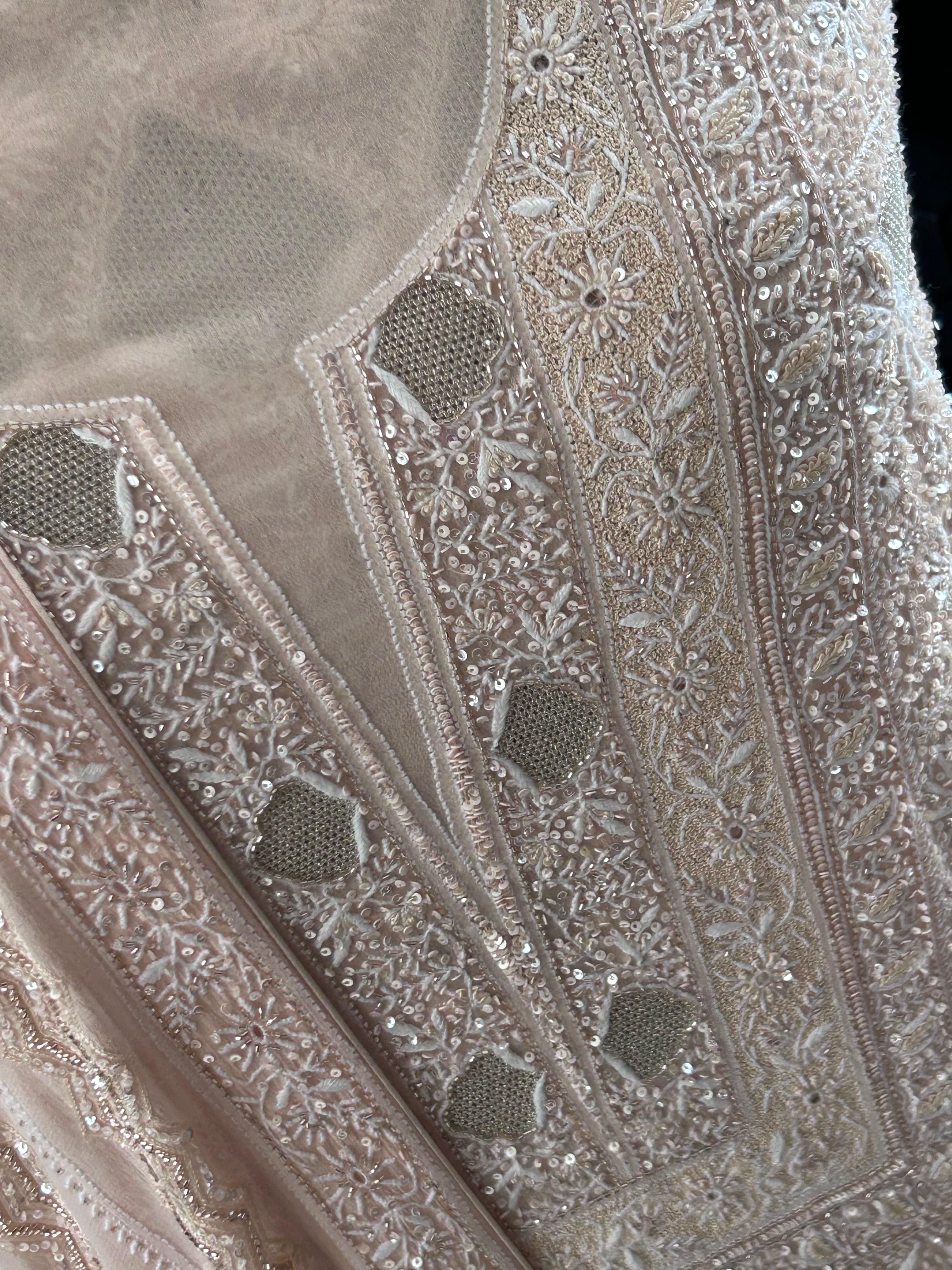 Peach georgette chikankari kurta set with statement jaal work