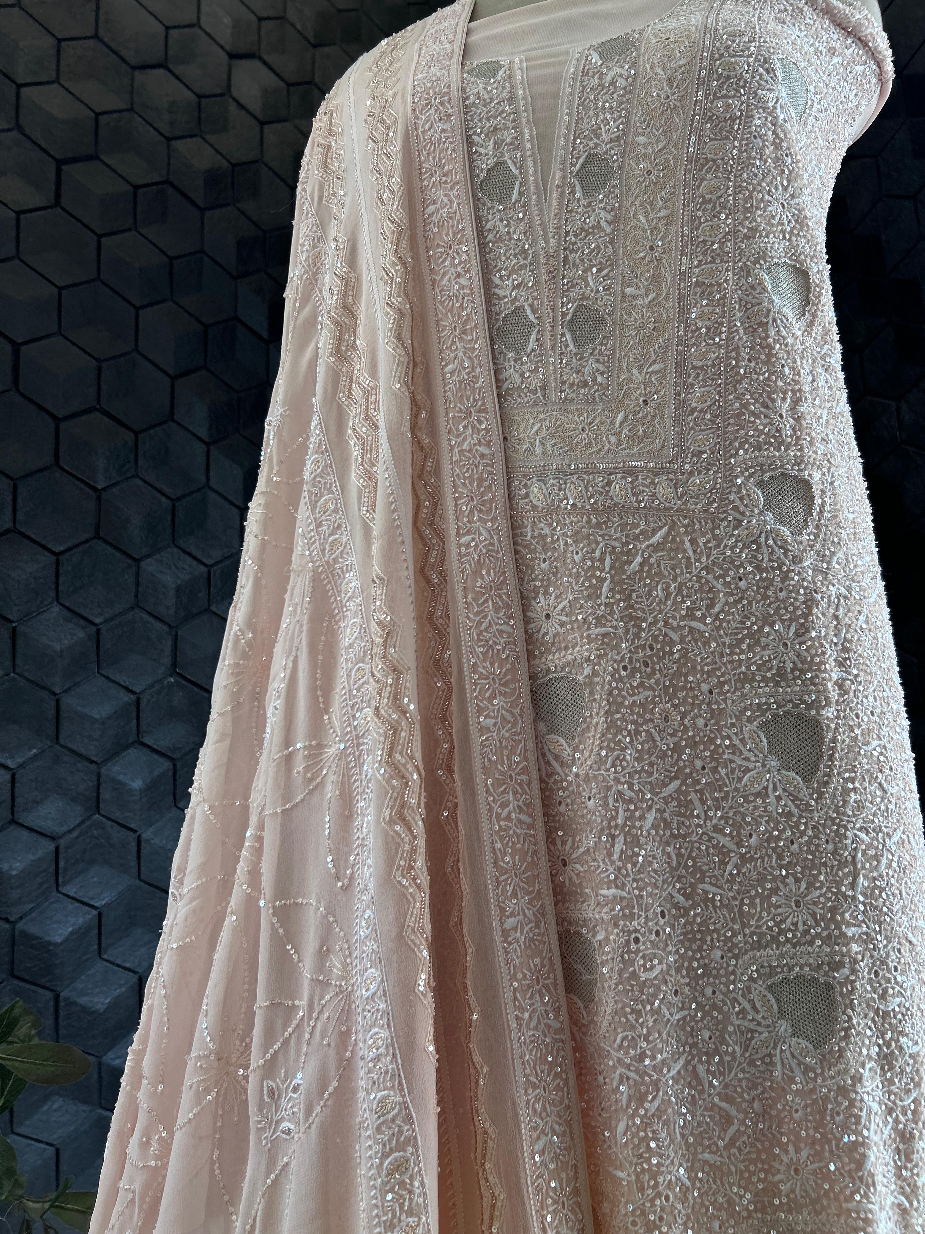 Peach georgette chikankari kurta set with statement jaal work
