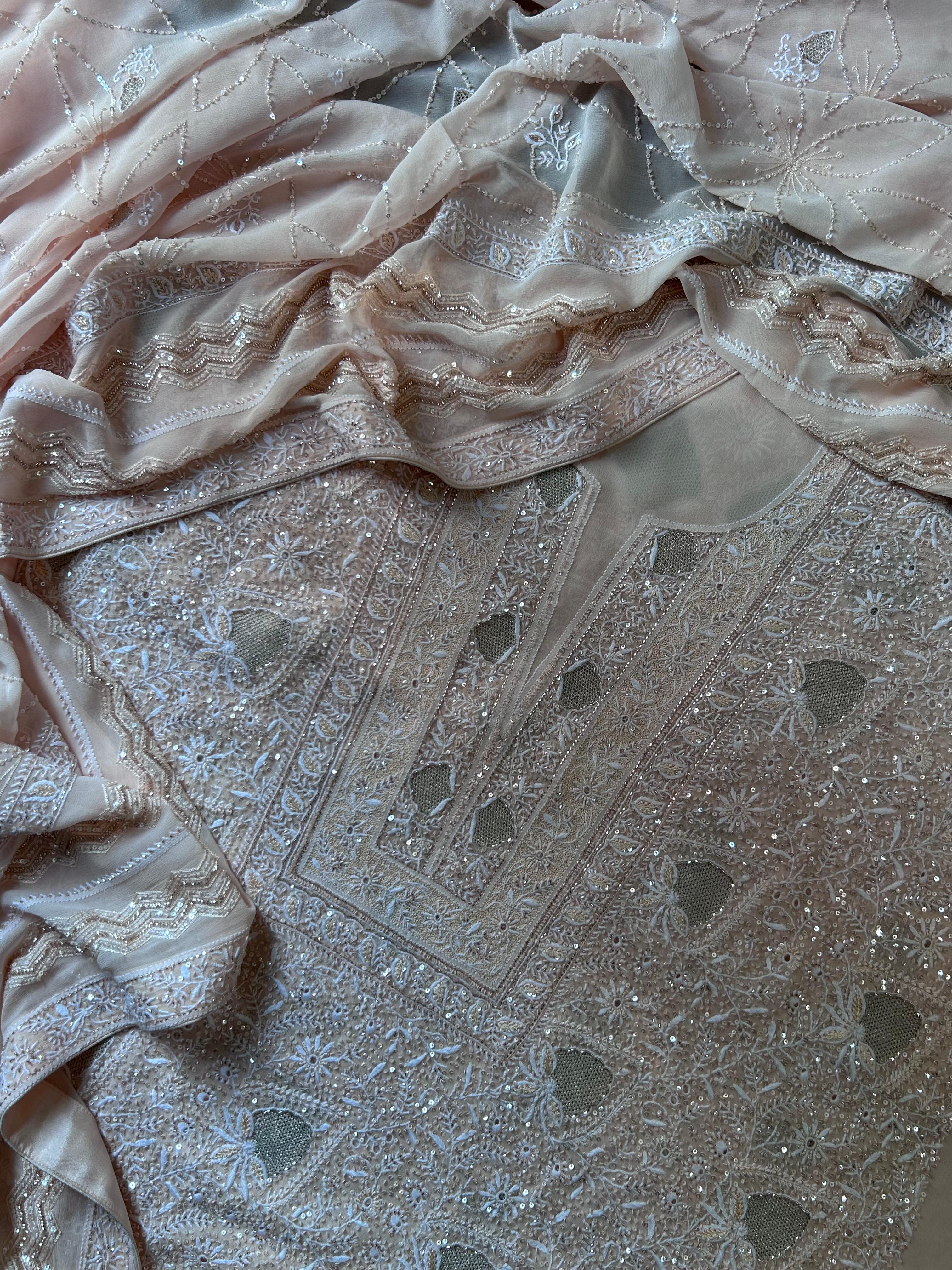Peach georgette chikankari kurta set with statement jaal work